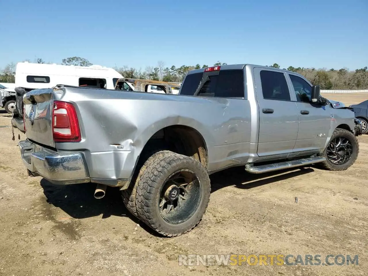 3 Photograph of a damaged car 3C63RPGL4MG592328 RAM 3500 2021