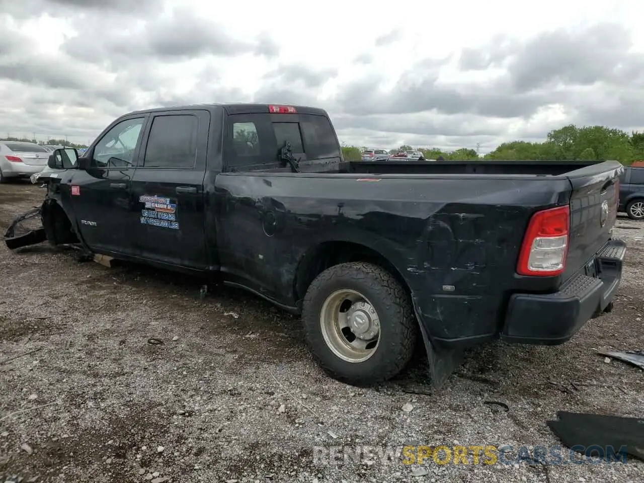 2 Photograph of a damaged car 3C63RRGL0MG528007 RAM 3500 2021