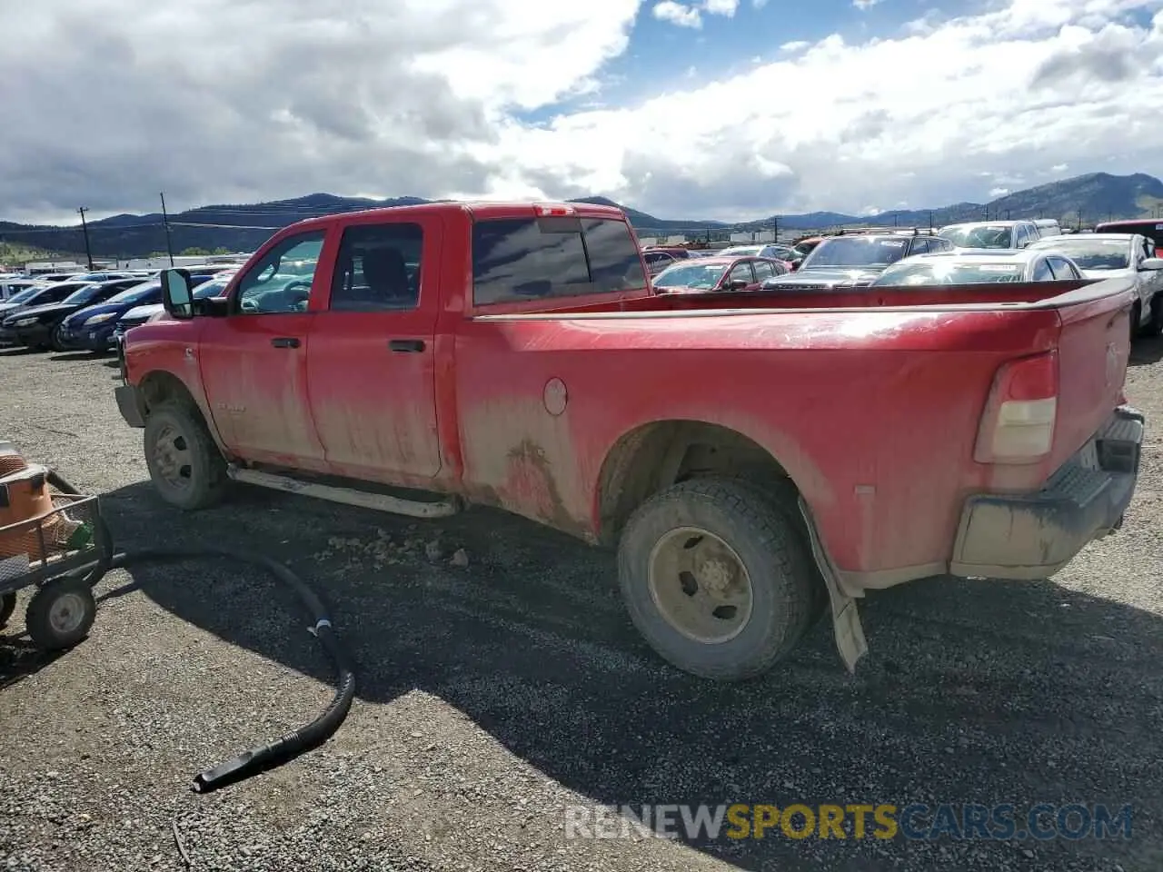 2 Photograph of a damaged car 3C63RRGL0MG565753 RAM 3500 2021
