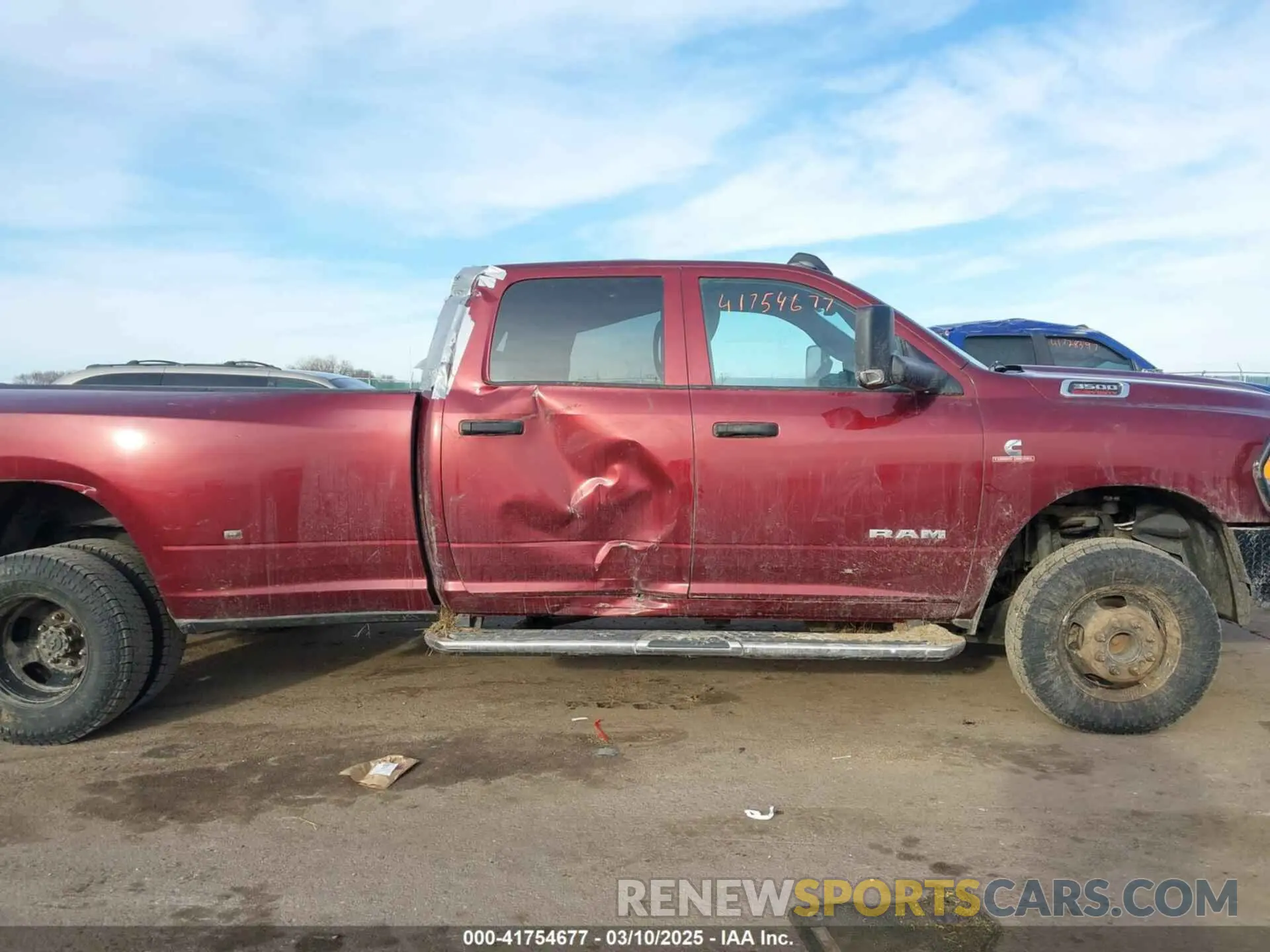 14 Photograph of a damaged car 3C63RRGL0MG588241 RAM 3500 2021