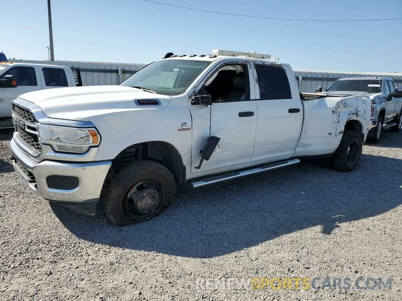 2 Photograph of a damaged car 3C63RRGL1MG690079 RAM 3500 2021