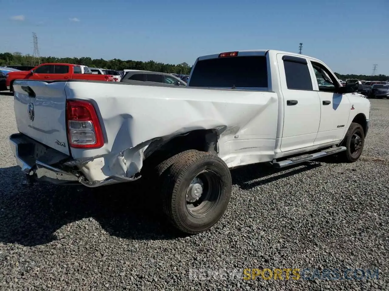 4 Photograph of a damaged car 3C63RRGL1MG690079 RAM 3500 2021
