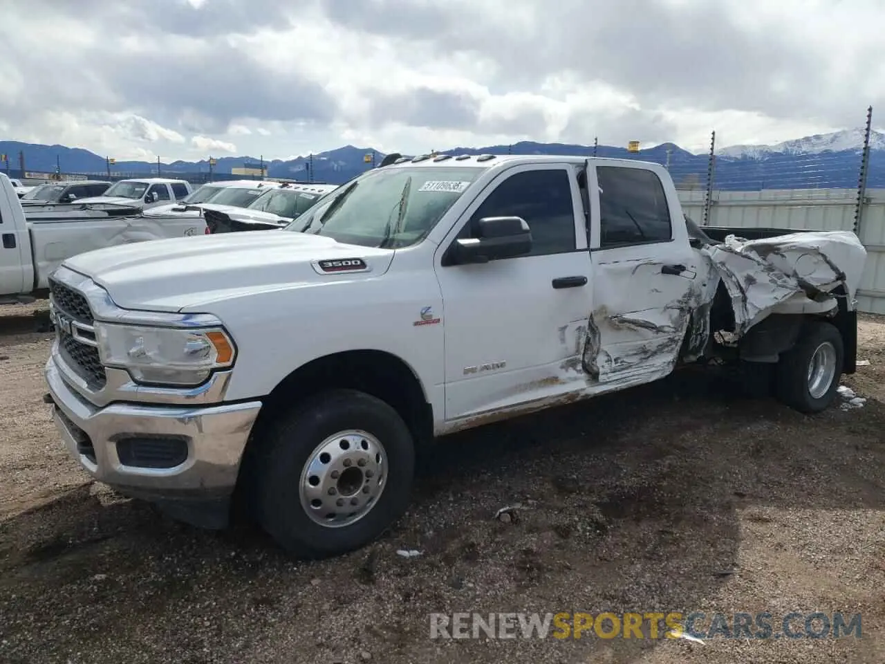 1 Photograph of a damaged car 3C63RRGL3MG617781 RAM 3500 2021