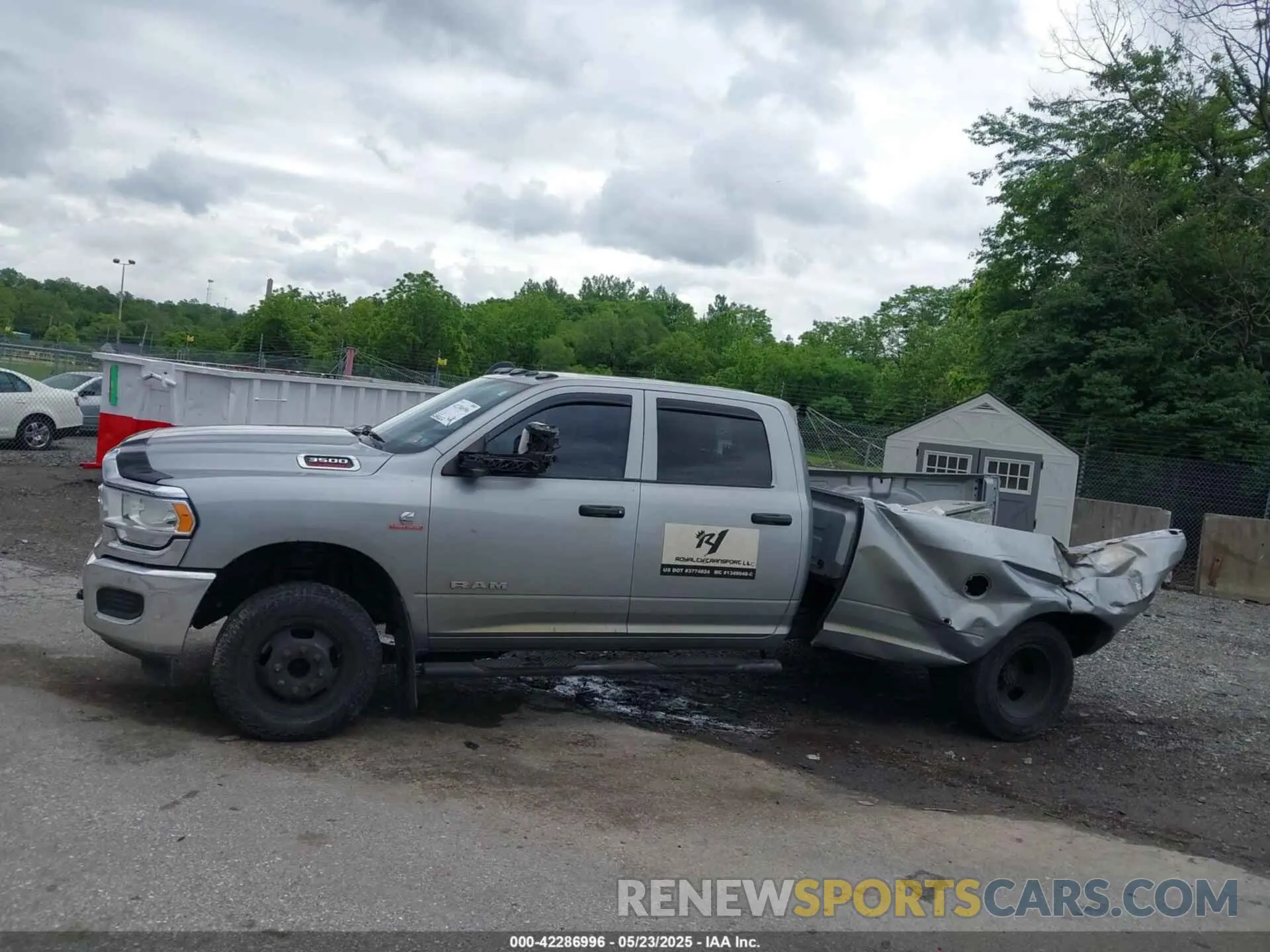 14 Photograph of a damaged car 3C63RRGL9MG549888 RAM 3500 2021