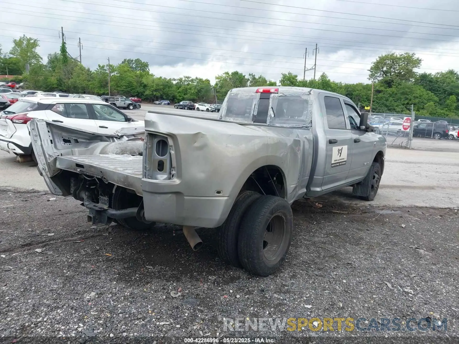 4 Photograph of a damaged car 3C63RRGL9MG549888 RAM 3500 2021