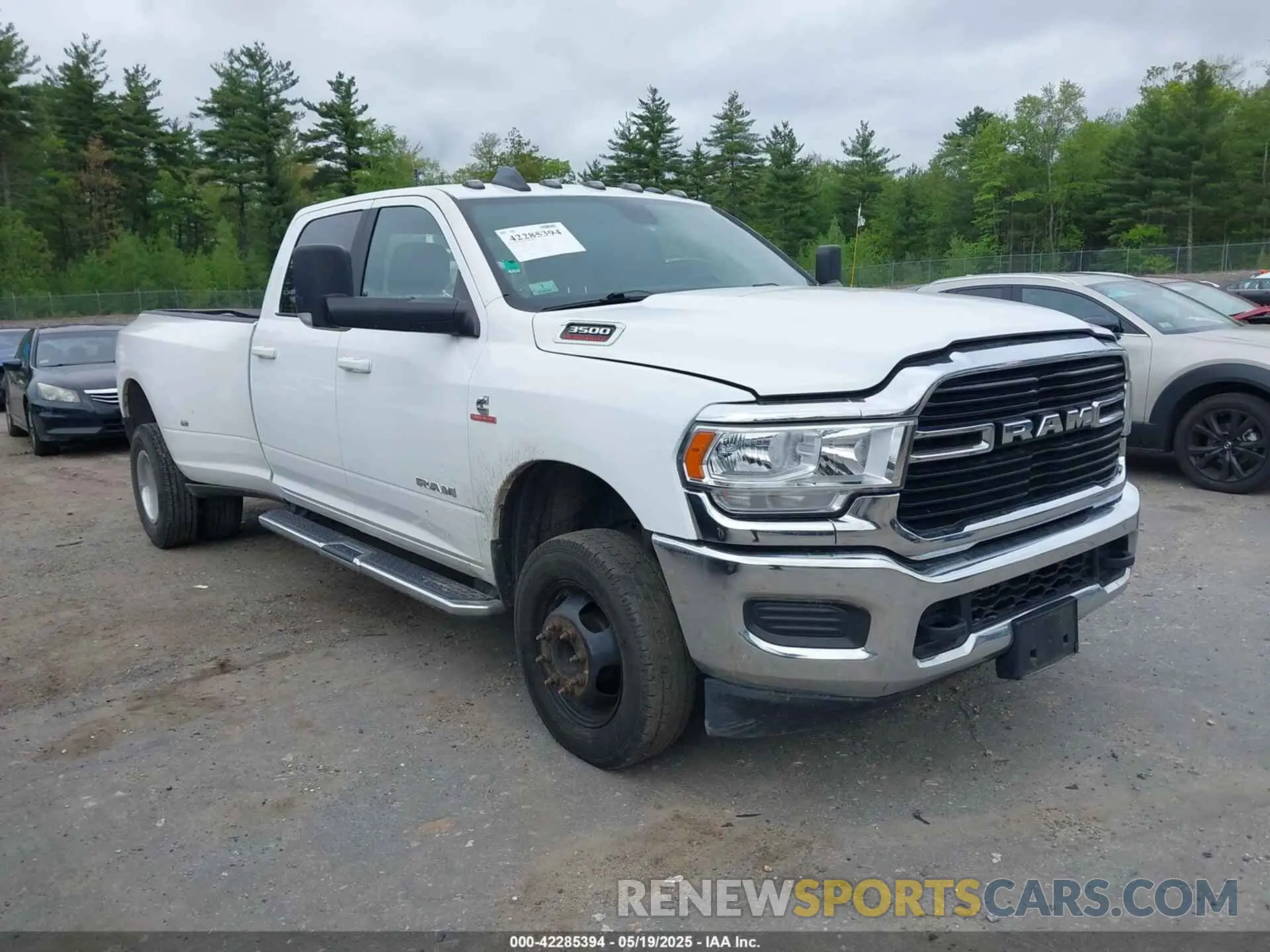 1 Photograph of a damaged car 3C63RRHL5MG527823 RAM 3500 2021