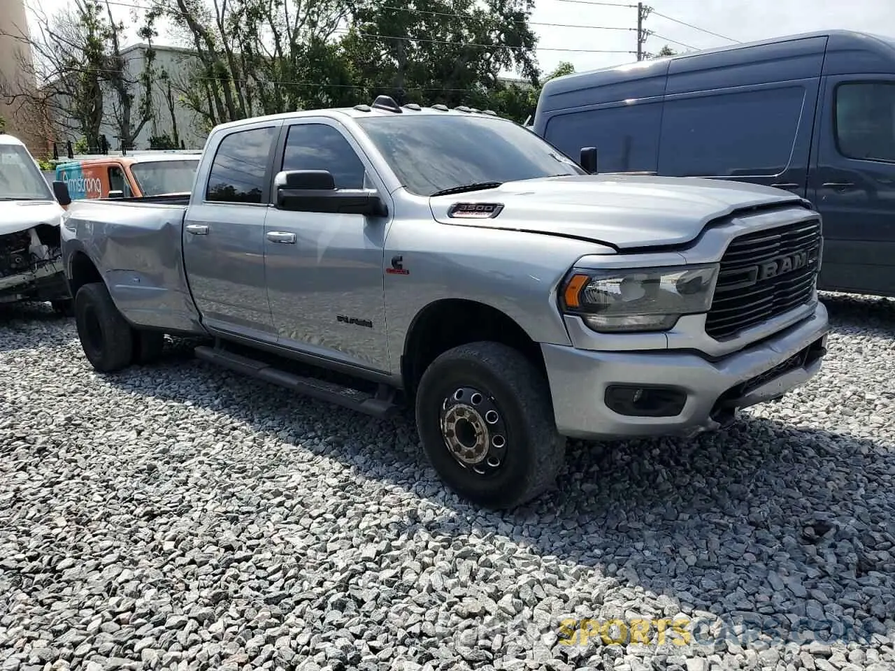 1 Photograph of a damaged car 3C63RRHLXMG537120 RAM 3500 2021