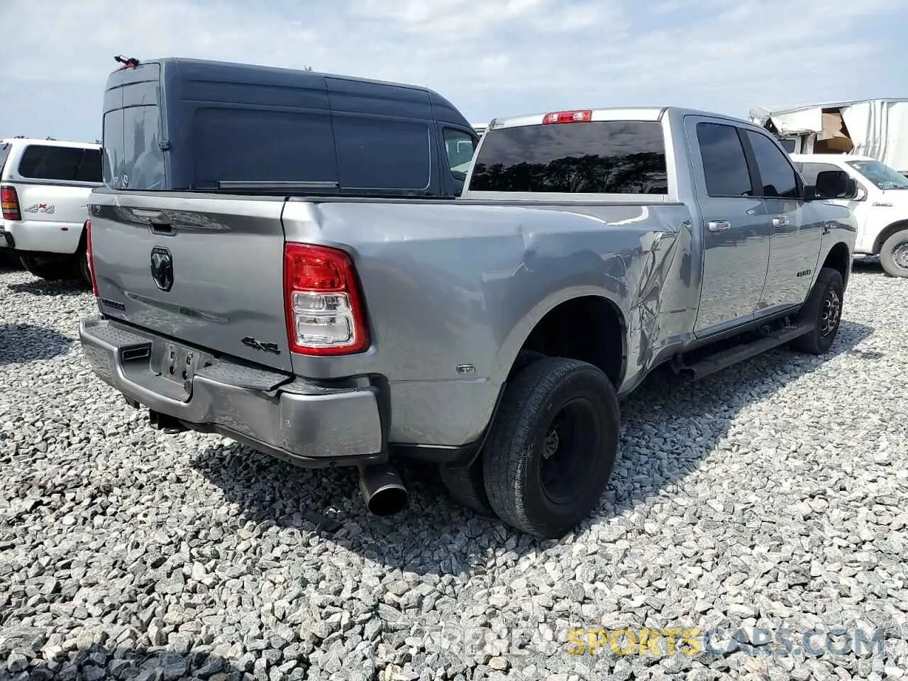 4 Photograph of a damaged car 3C63RRHLXMG537120 RAM 3500 2021