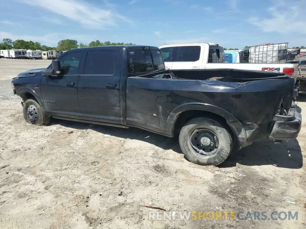 2 Photograph of a damaged car 3C63RRJL3MG576917 RAM 3500 2021