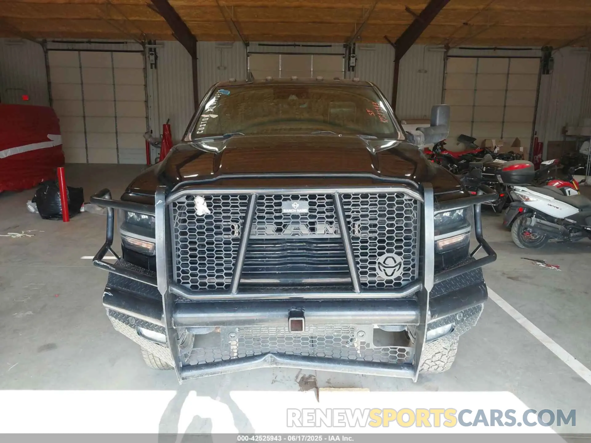 14 Photograph of a damaged car 3C63RRJL7MG550174 RAM 3500 2021