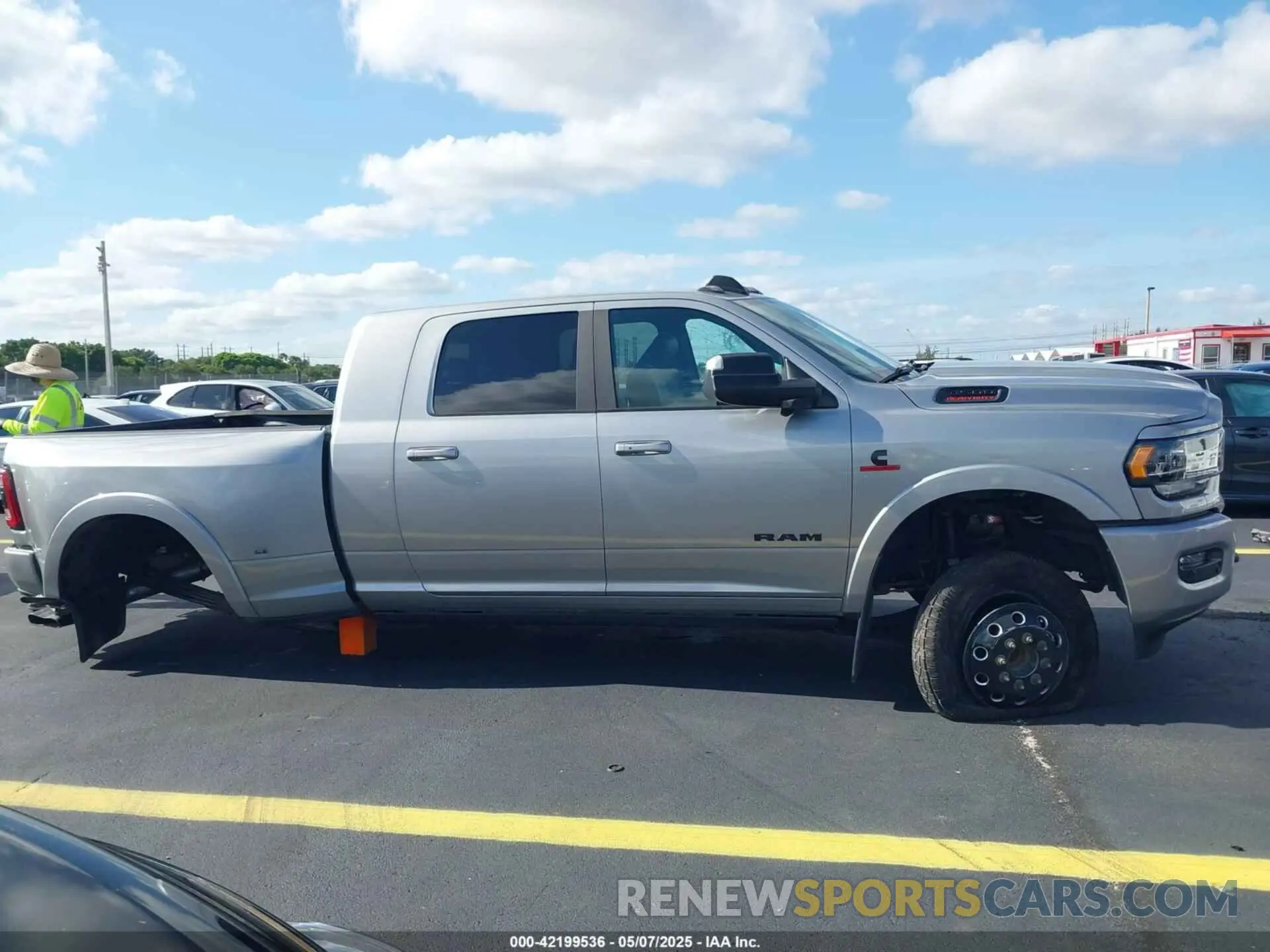 13 Photograph of a damaged car 3C63RRPL4MG508178 RAM 3500 2021