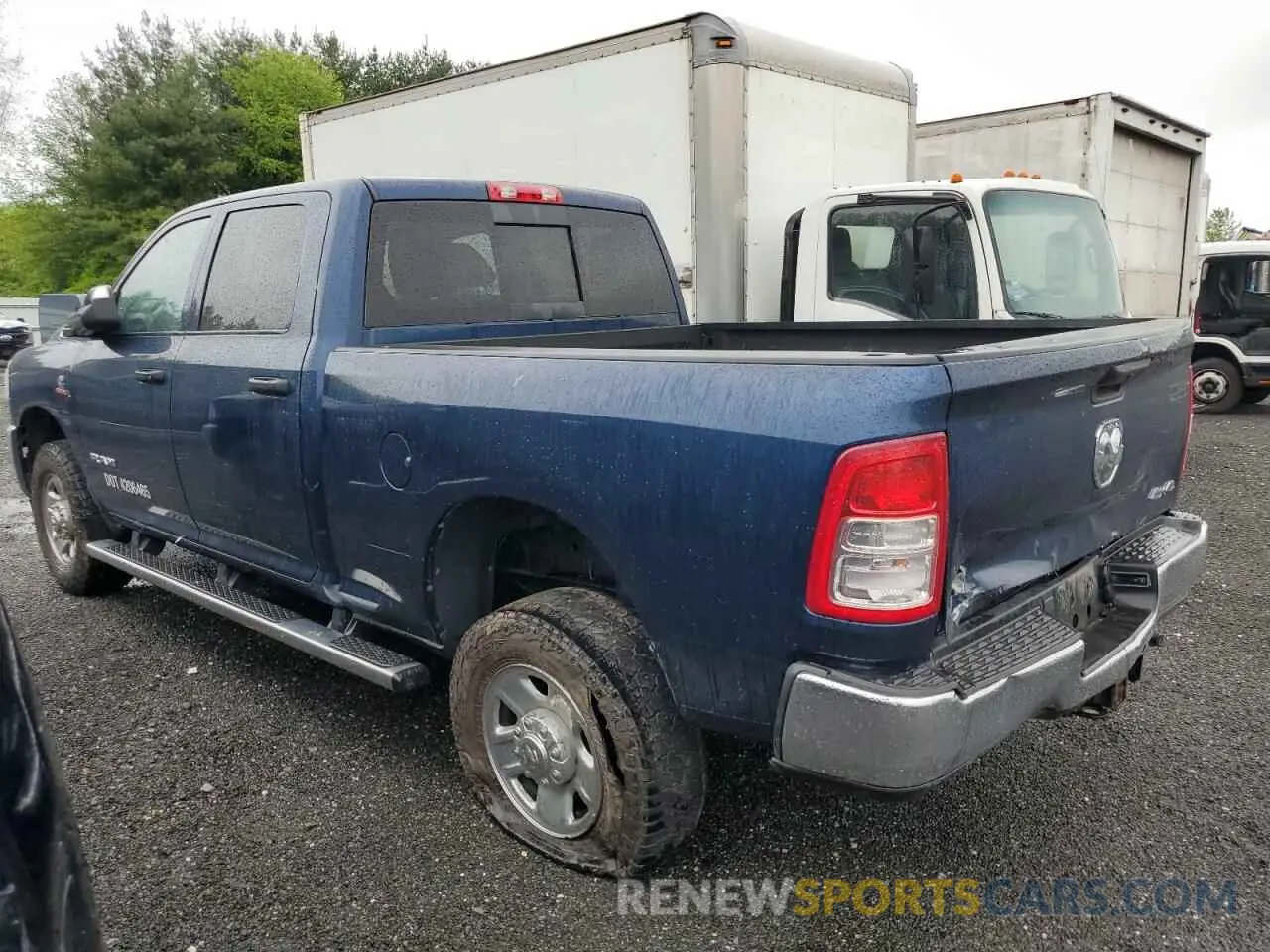 2 Photograph of a damaged car 3C63R3CL0NG226219 RAM 3500 2022