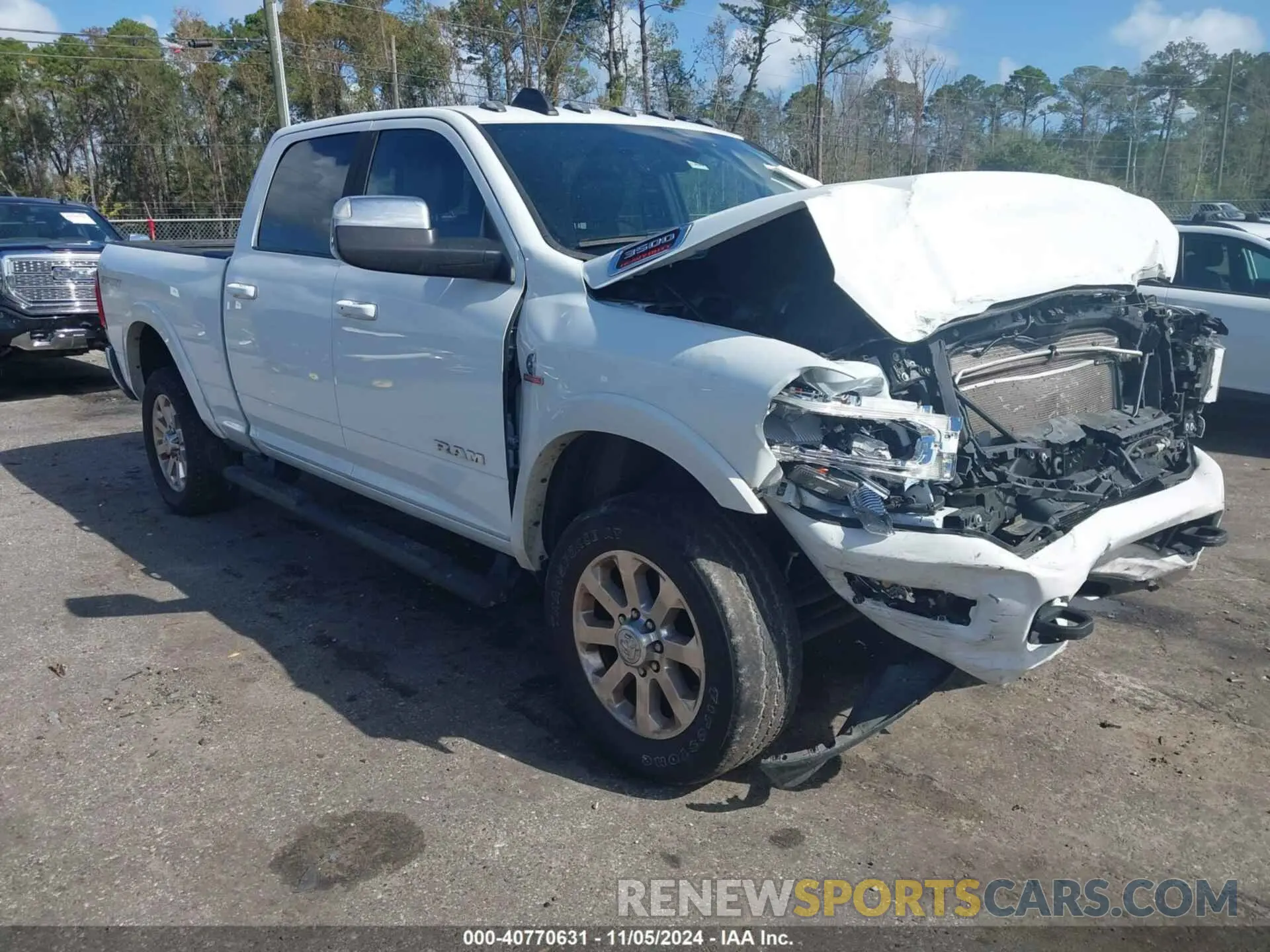 1 Photograph of a damaged car 3C63R3EL3NG353074 RAM 3500 2022