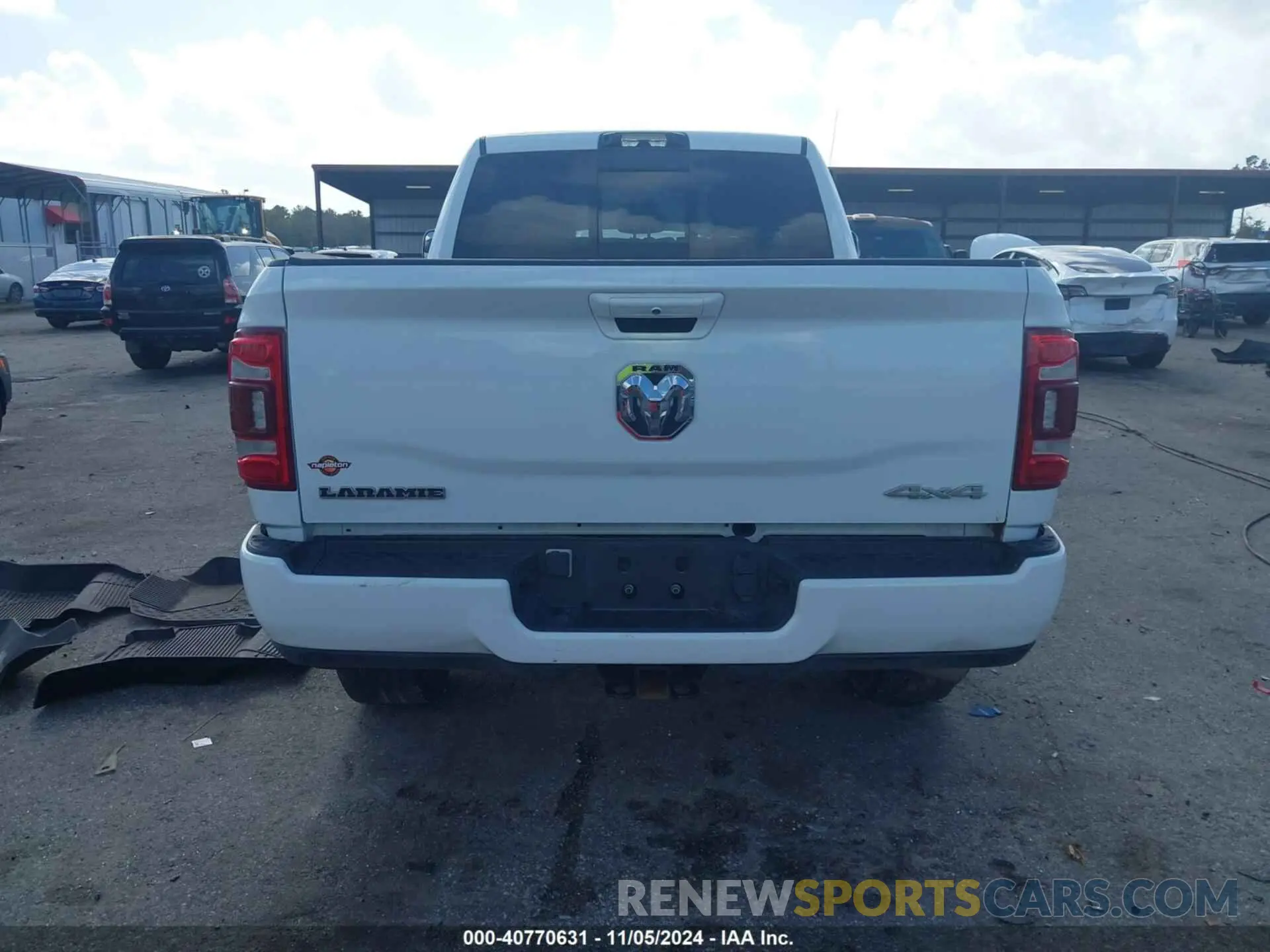15 Photograph of a damaged car 3C63R3EL3NG353074 RAM 3500 2022