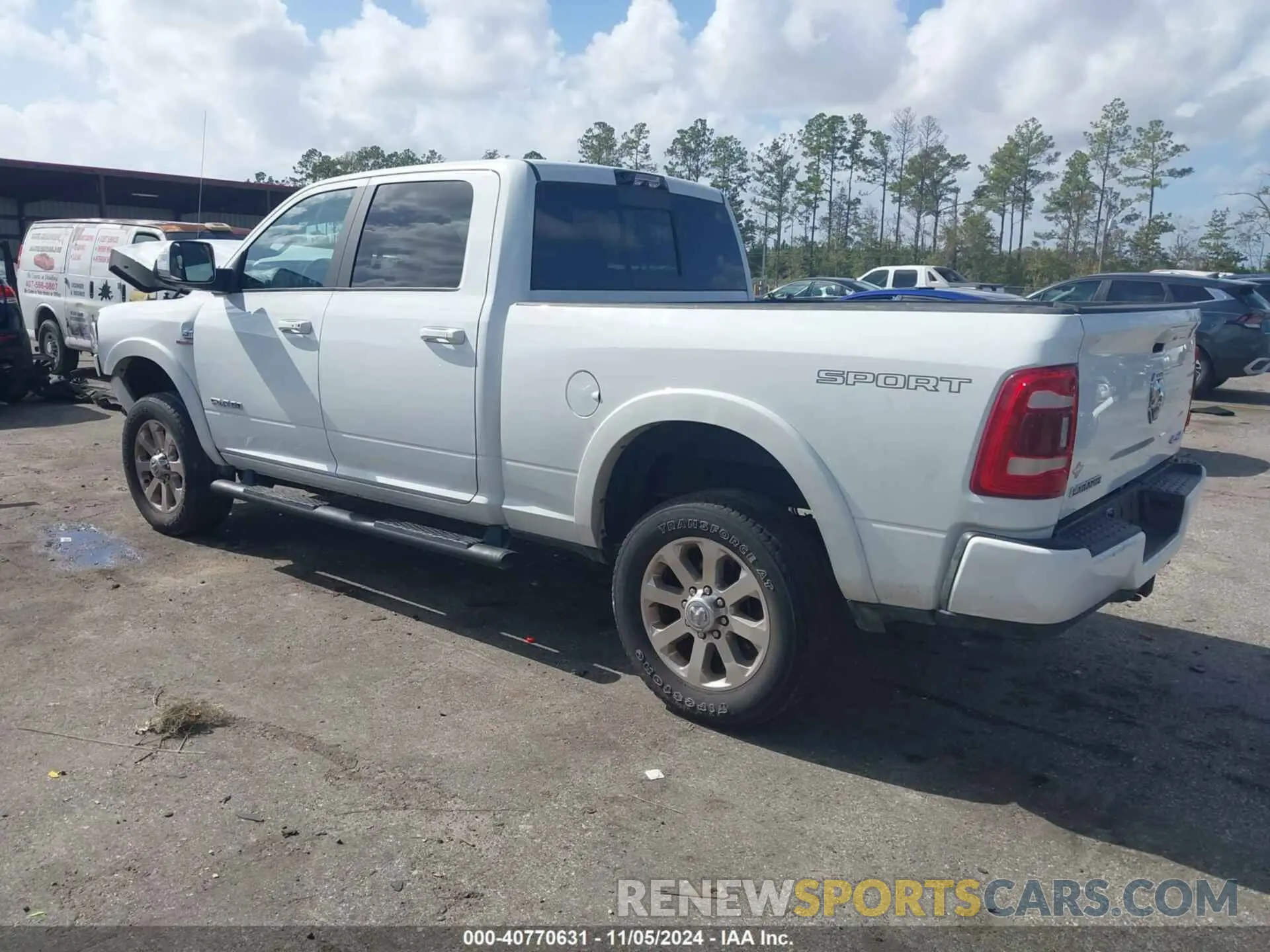 3 Photograph of a damaged car 3C63R3EL3NG353074 RAM 3500 2022