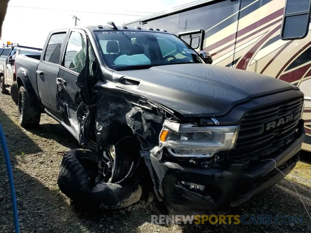 4 Photograph of a damaged car 3C63R3EL8NG215286 RAM 3500 2022