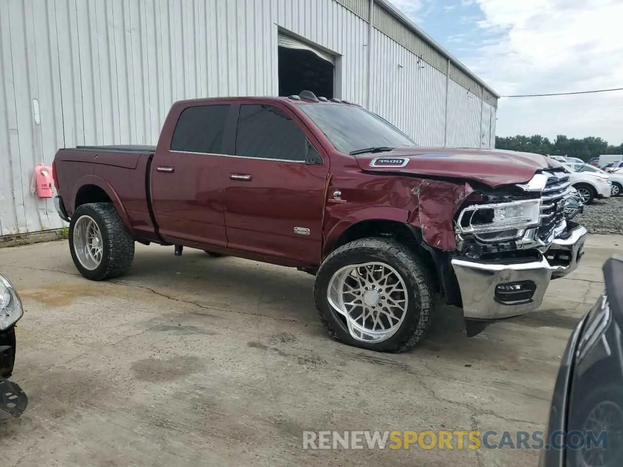 4 Photograph of a damaged car 3C63R3FL6NG191519 RAM 3500 2022