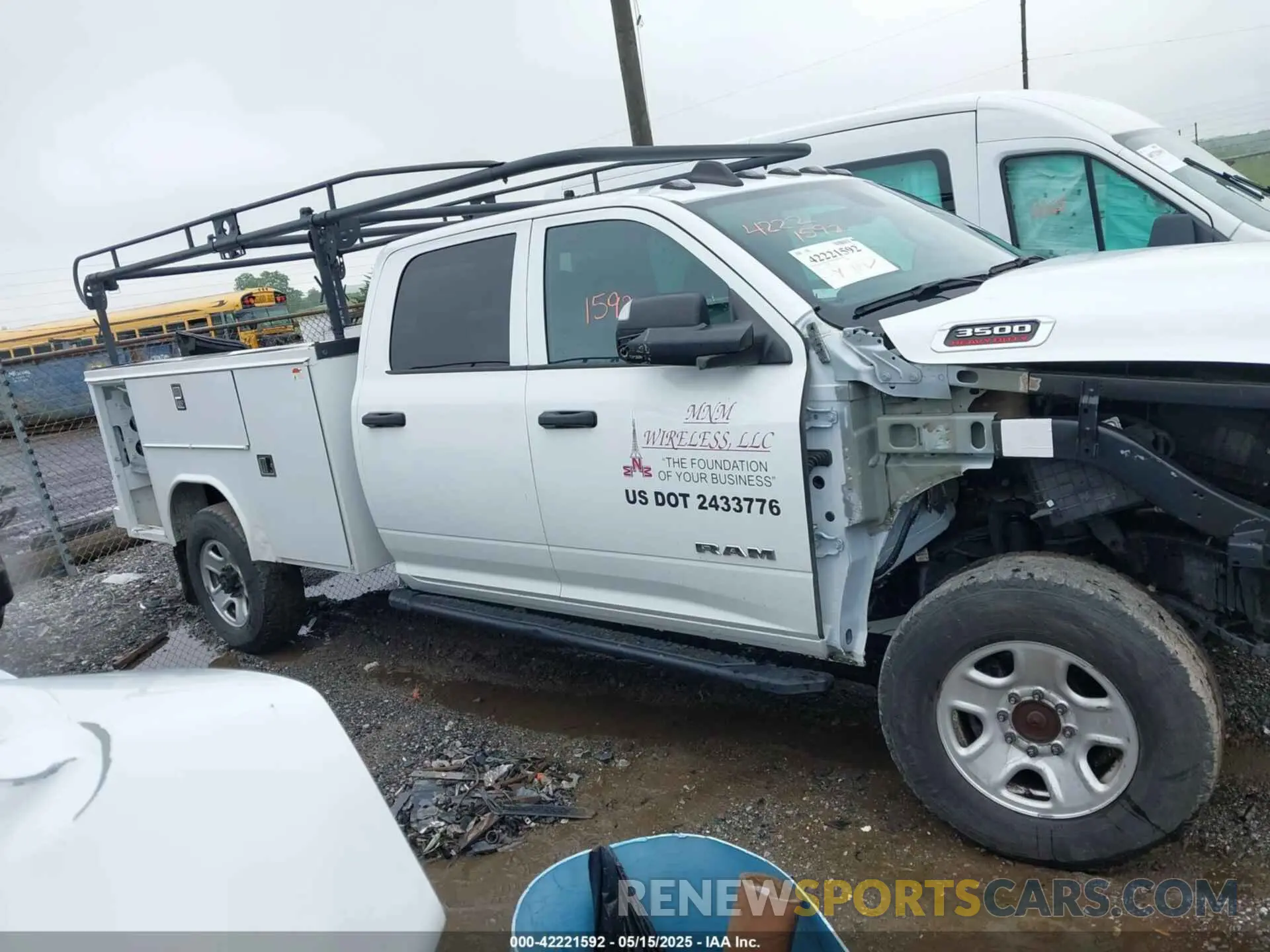 13 Photograph of a damaged car 3C63R3GJ5NG310870 RAM 3500 2022