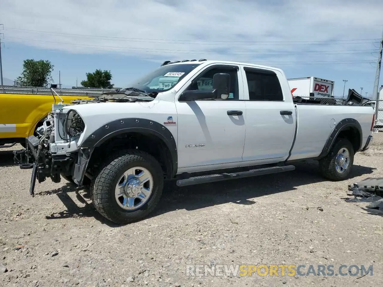 1 Photograph of a damaged car 3C63R3GL3NG135102 RAM 3500 2022