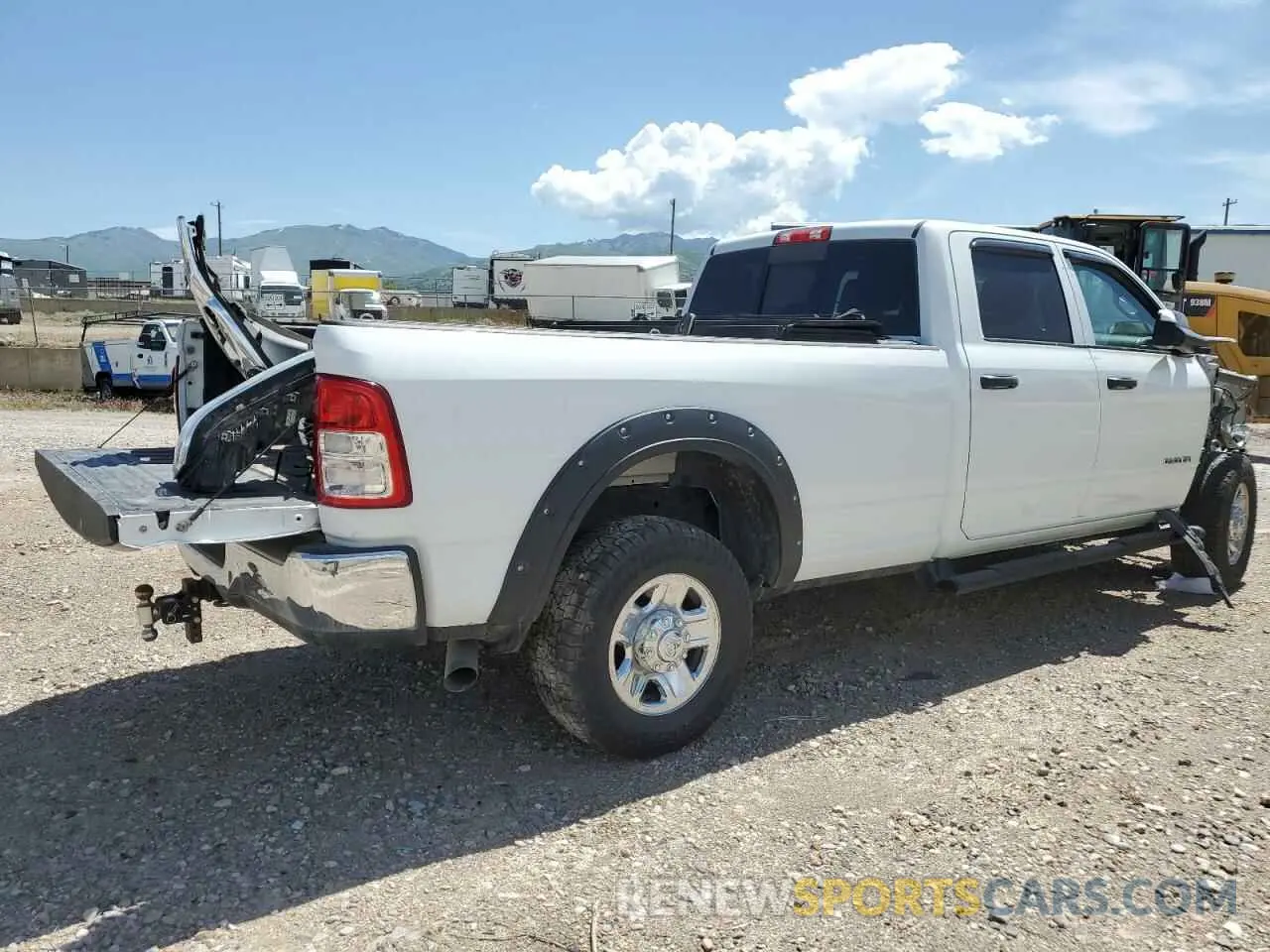 3 Photograph of a damaged car 3C63R3GL3NG135102 RAM 3500 2022