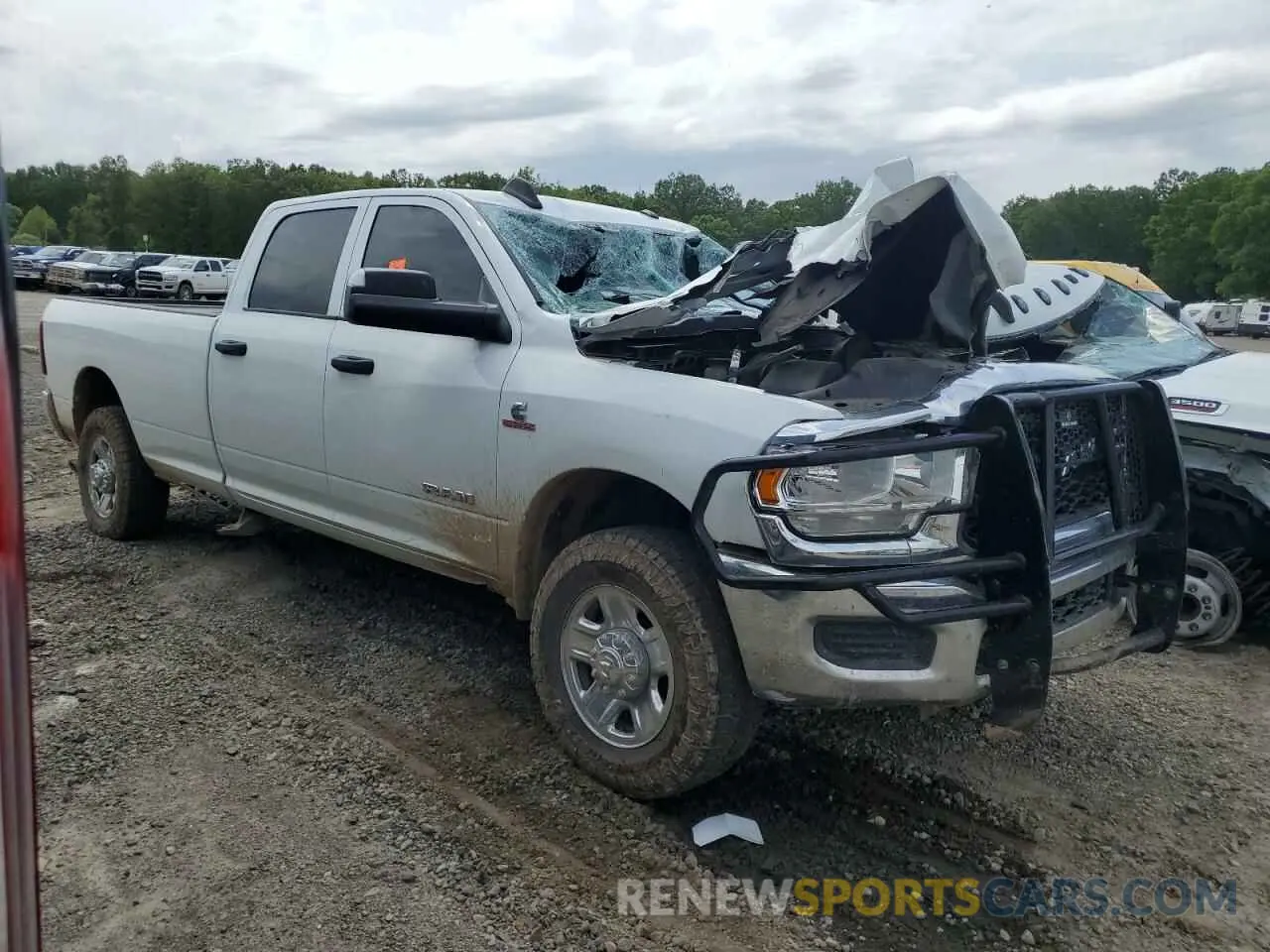 4 Photograph of a damaged car 3C63R3GL4NG415529 RAM 3500 2022