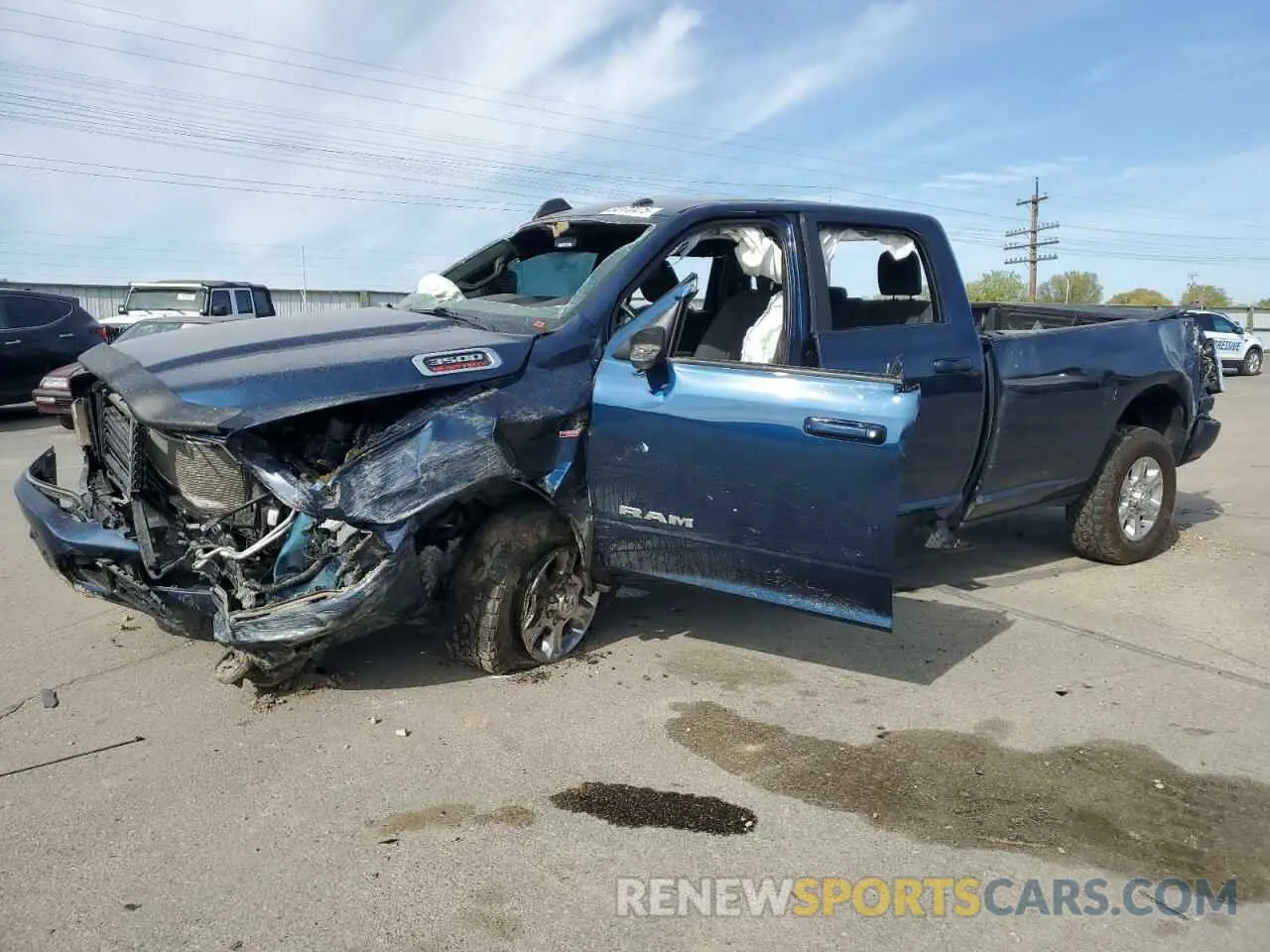 1 Photograph of a damaged car 3C63R3HL5NG151624 RAM 3500 2022