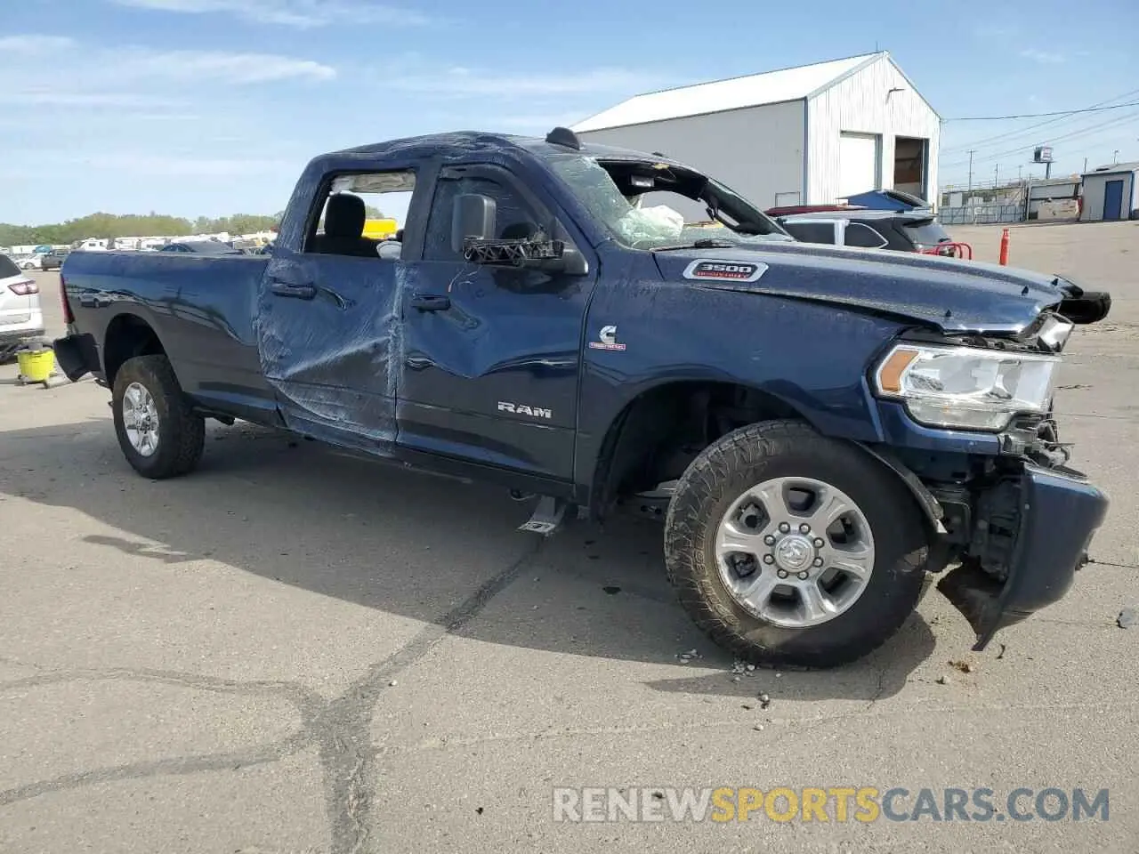 4 Photograph of a damaged car 3C63R3HL5NG151624 RAM 3500 2022