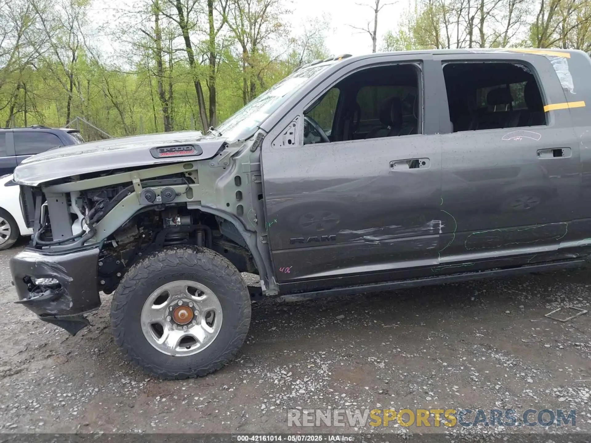 11 Photograph of a damaged car 3C63R3PL1NG304324 RAM 3500 2022