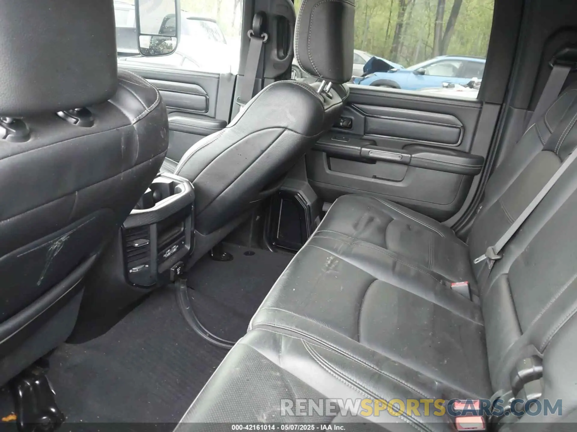 7 Photograph of a damaged car 3C63R3PL1NG304324 RAM 3500 2022