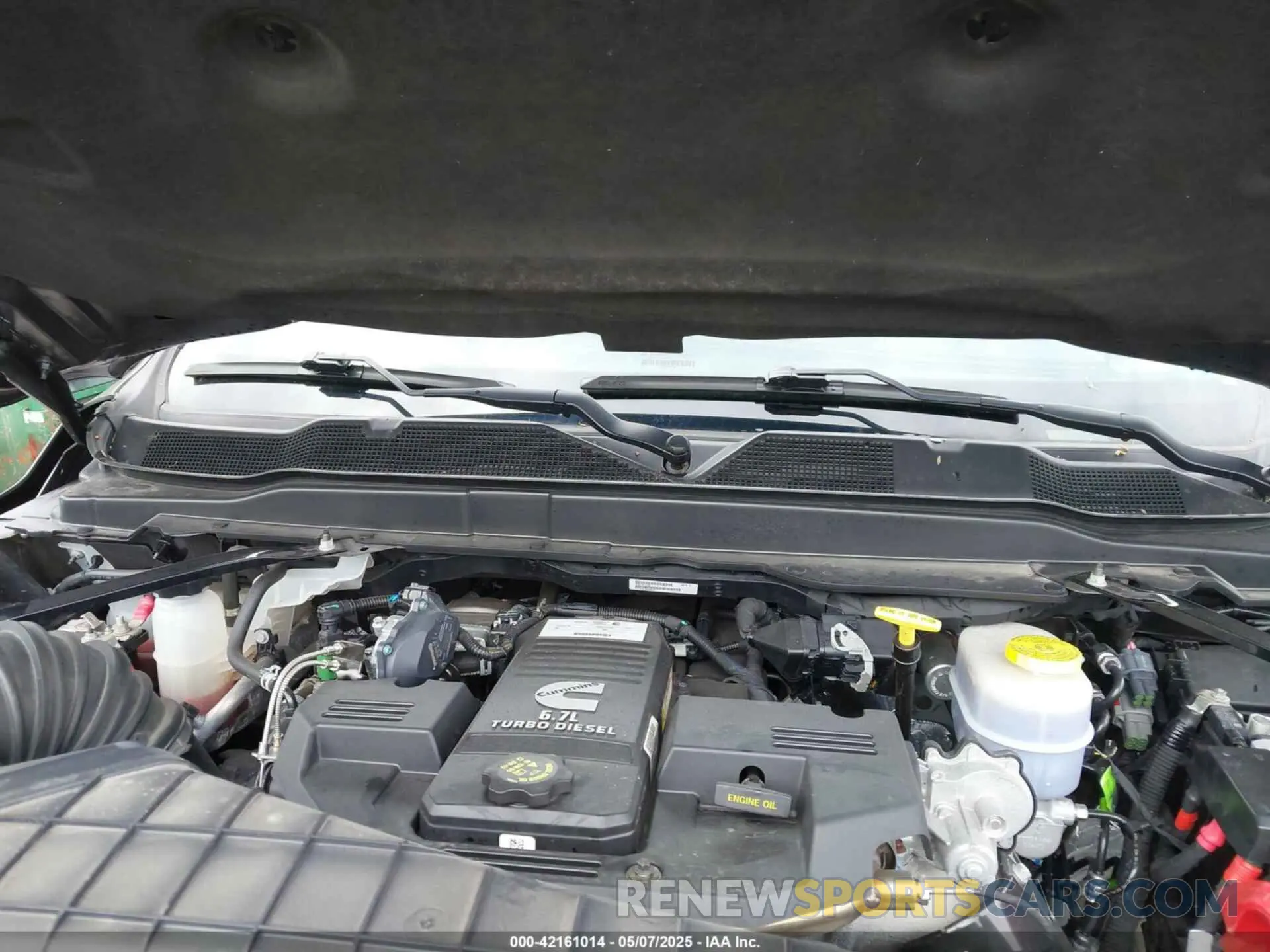 9 Photograph of a damaged car 3C63R3PL1NG304324 RAM 3500 2022