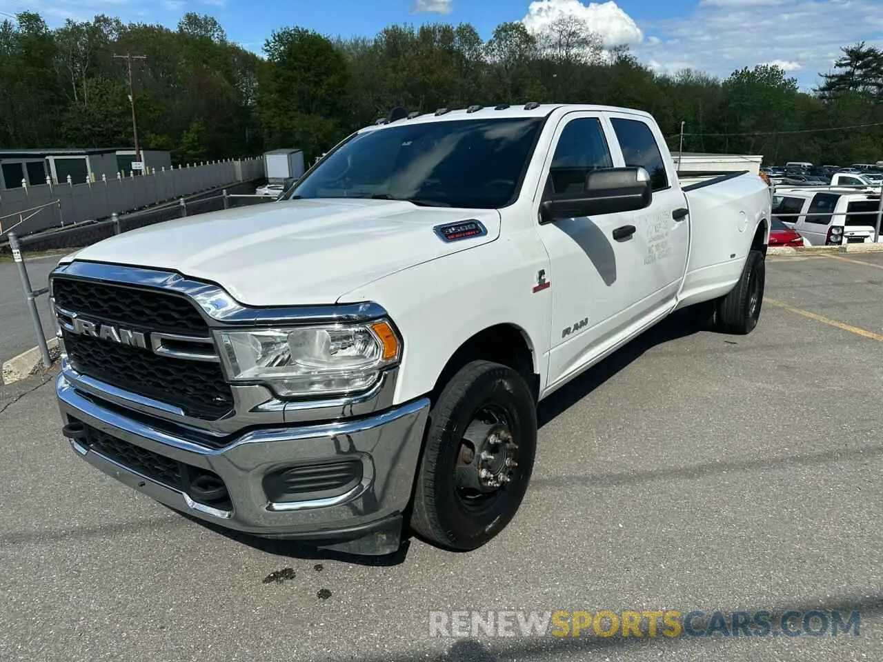 1 Photograph of a damaged car 3C63RPGL7NG190837 RAM 3500 2022