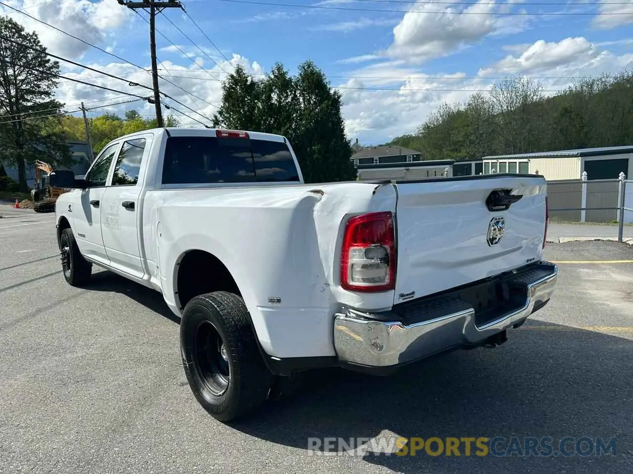 2 Photograph of a damaged car 3C63RPGL7NG190837 RAM 3500 2022