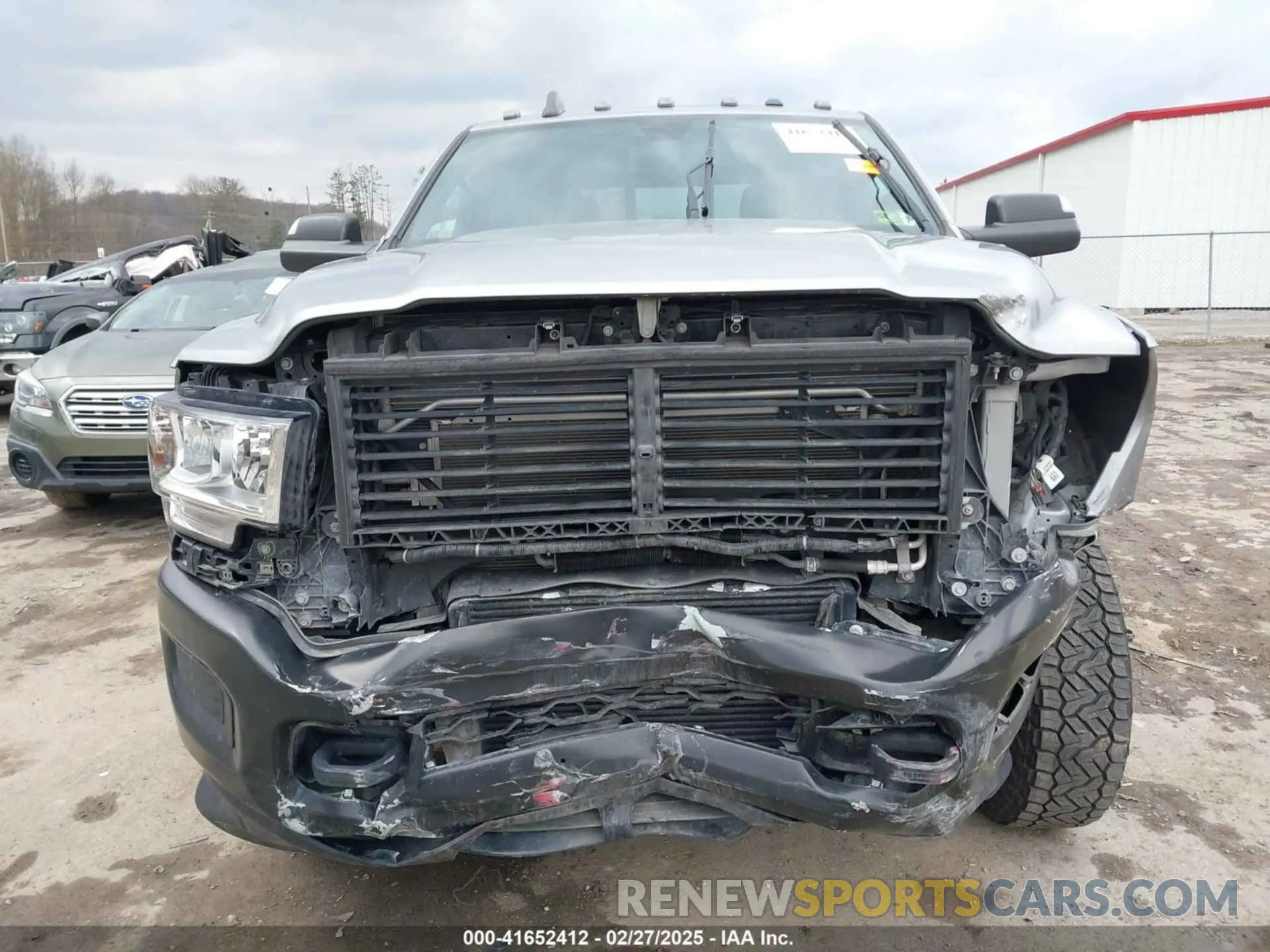 11 Photograph of a damaged car 3C63RRGL0NG114484 RAM 3500 2022