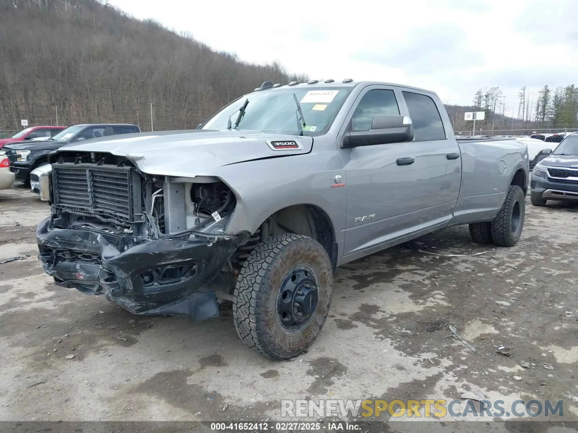 2 Photograph of a damaged car 3C63RRGL0NG114484 RAM 3500 2022