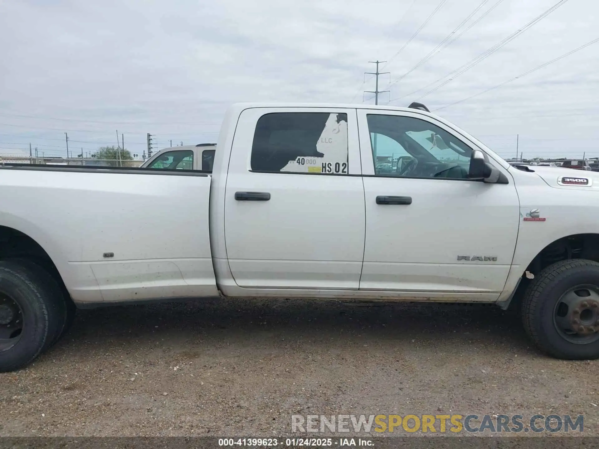 13 Photograph of a damaged car 3C63RRGL0NG151826 RAM 3500 2022