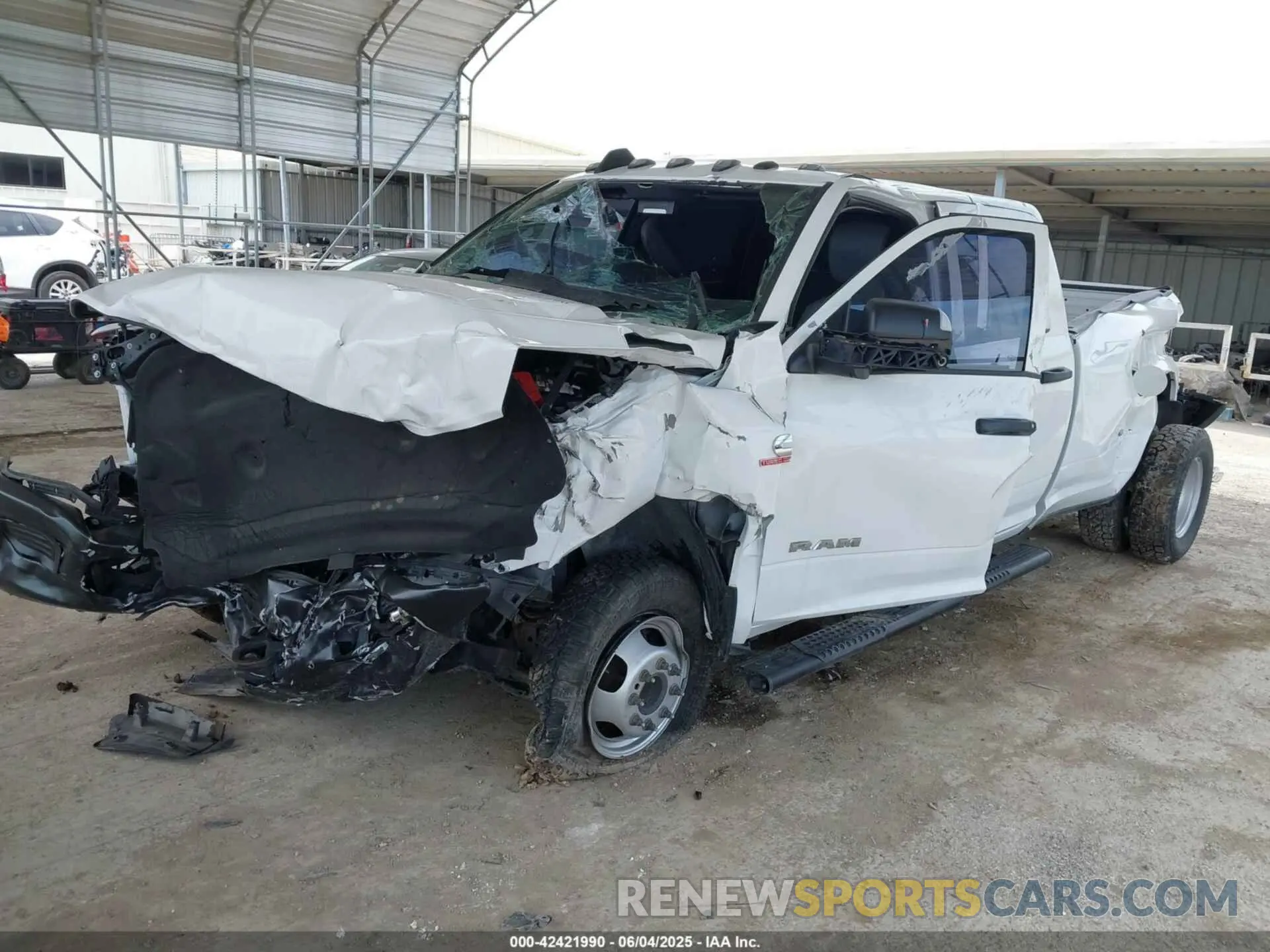 2 Photograph of a damaged car 3C63RRGL6NG139843 RAM 3500 2022