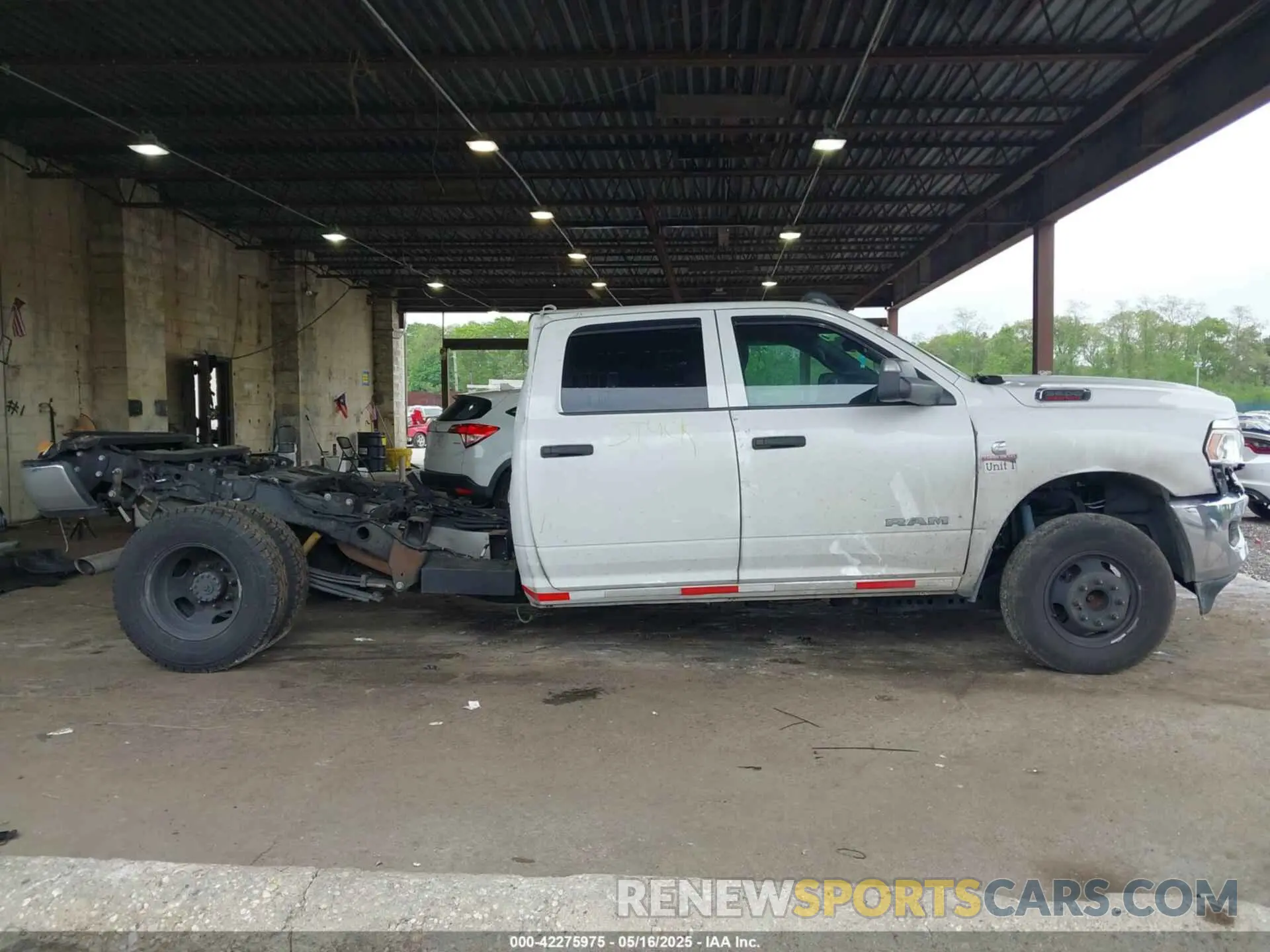 13 Photograph of a damaged car 3C63RRGL7NG152181 RAM 3500 2022