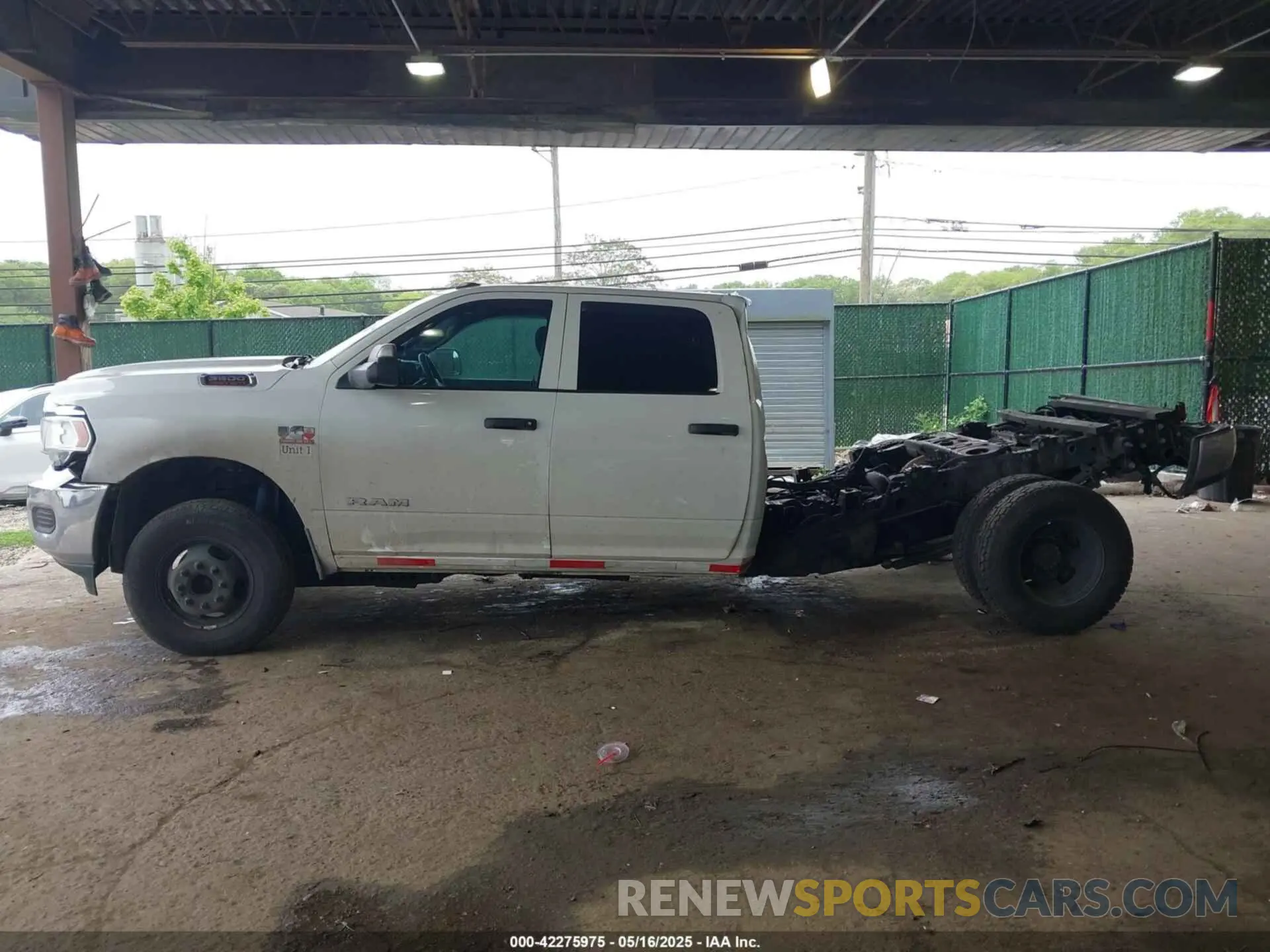 14 Photograph of a damaged car 3C63RRGL7NG152181 RAM 3500 2022