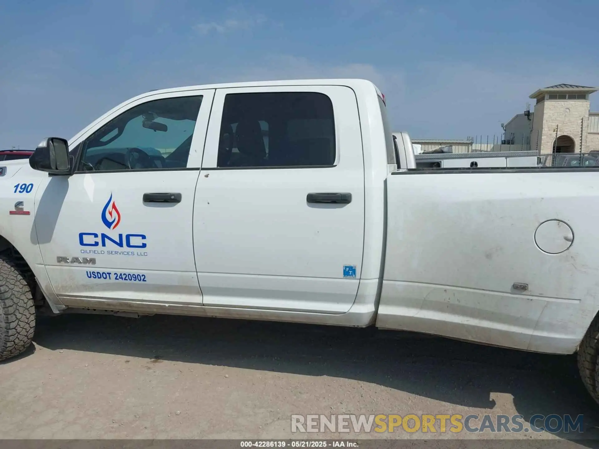14 Photograph of a damaged car 3C63RRGL8NG303240 RAM 3500 2022