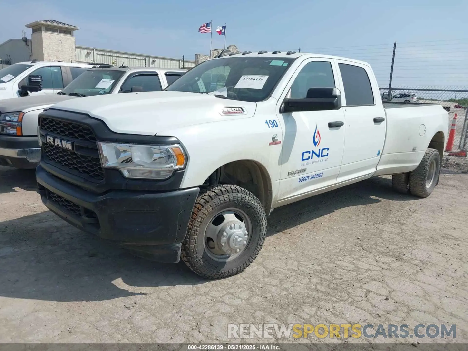 2 Photograph of a damaged car 3C63RRGL8NG303240 RAM 3500 2022