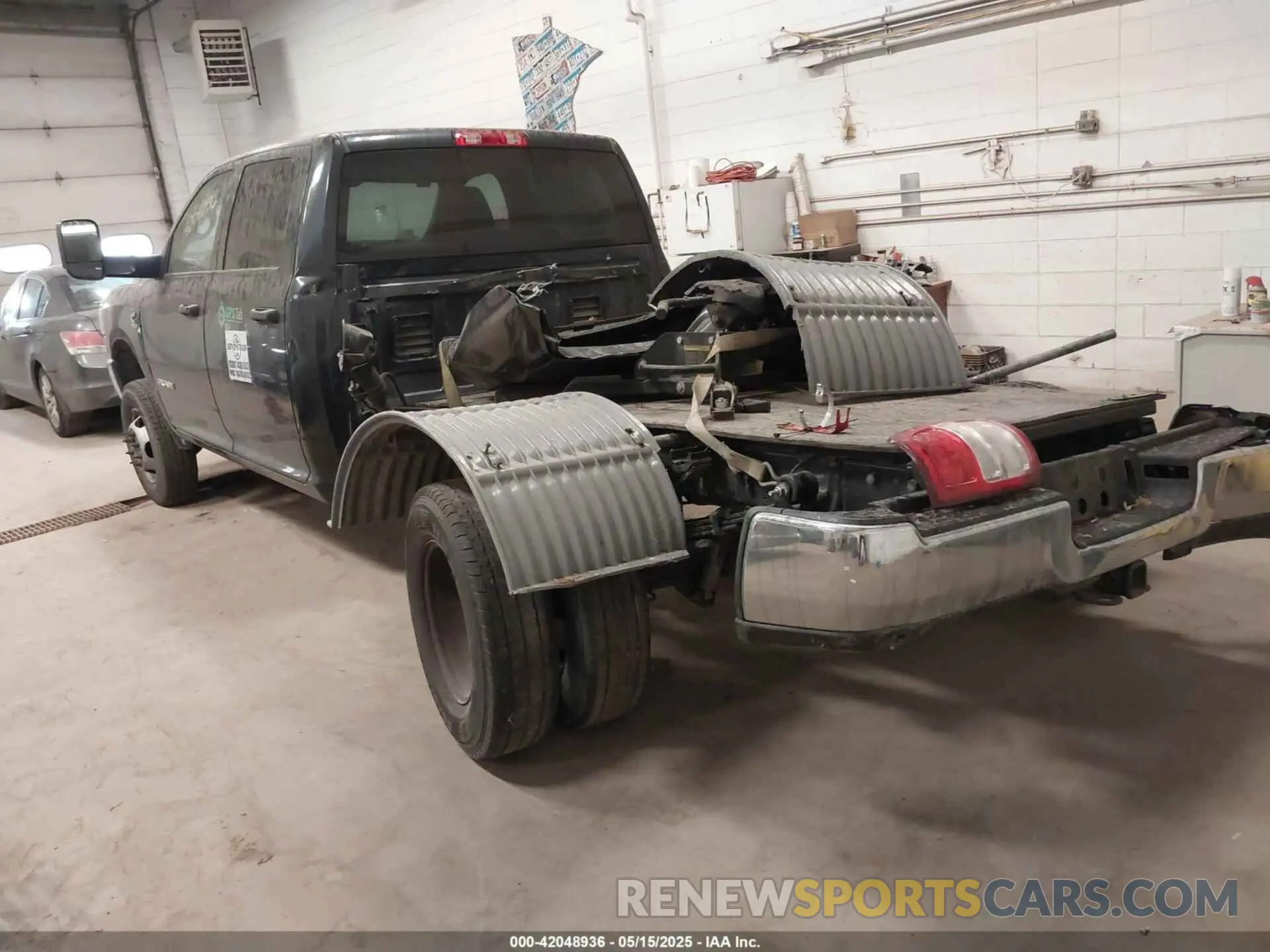3 Photograph of a damaged car 3C63RRGL9NG196294 RAM 3500 2022