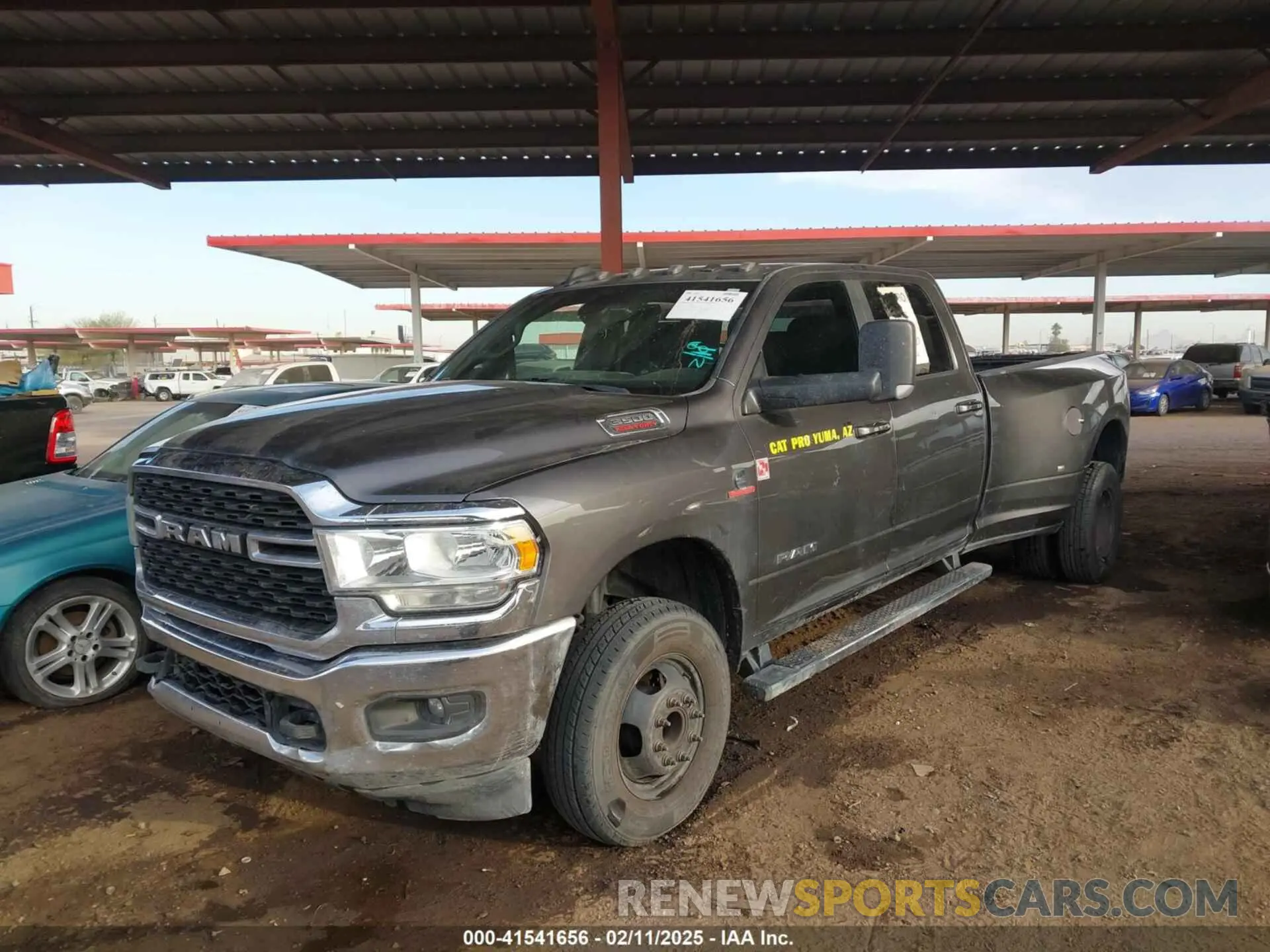 2 Photograph of a damaged car 3C63RRHL1NG189189 RAM 3500 2022