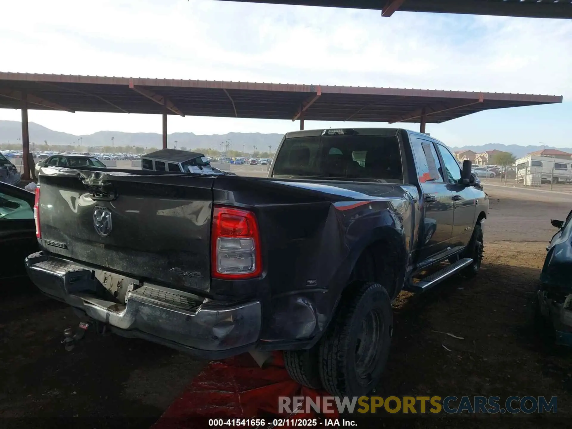4 Photograph of a damaged car 3C63RRHL1NG189189 RAM 3500 2022
