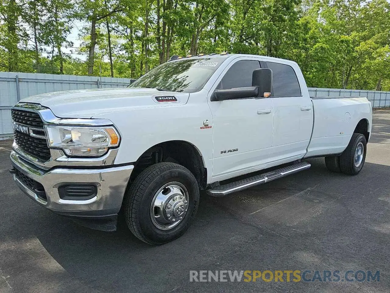 1 Photograph of a damaged car 3C63RRHL5NG291370 RAM 3500 2022