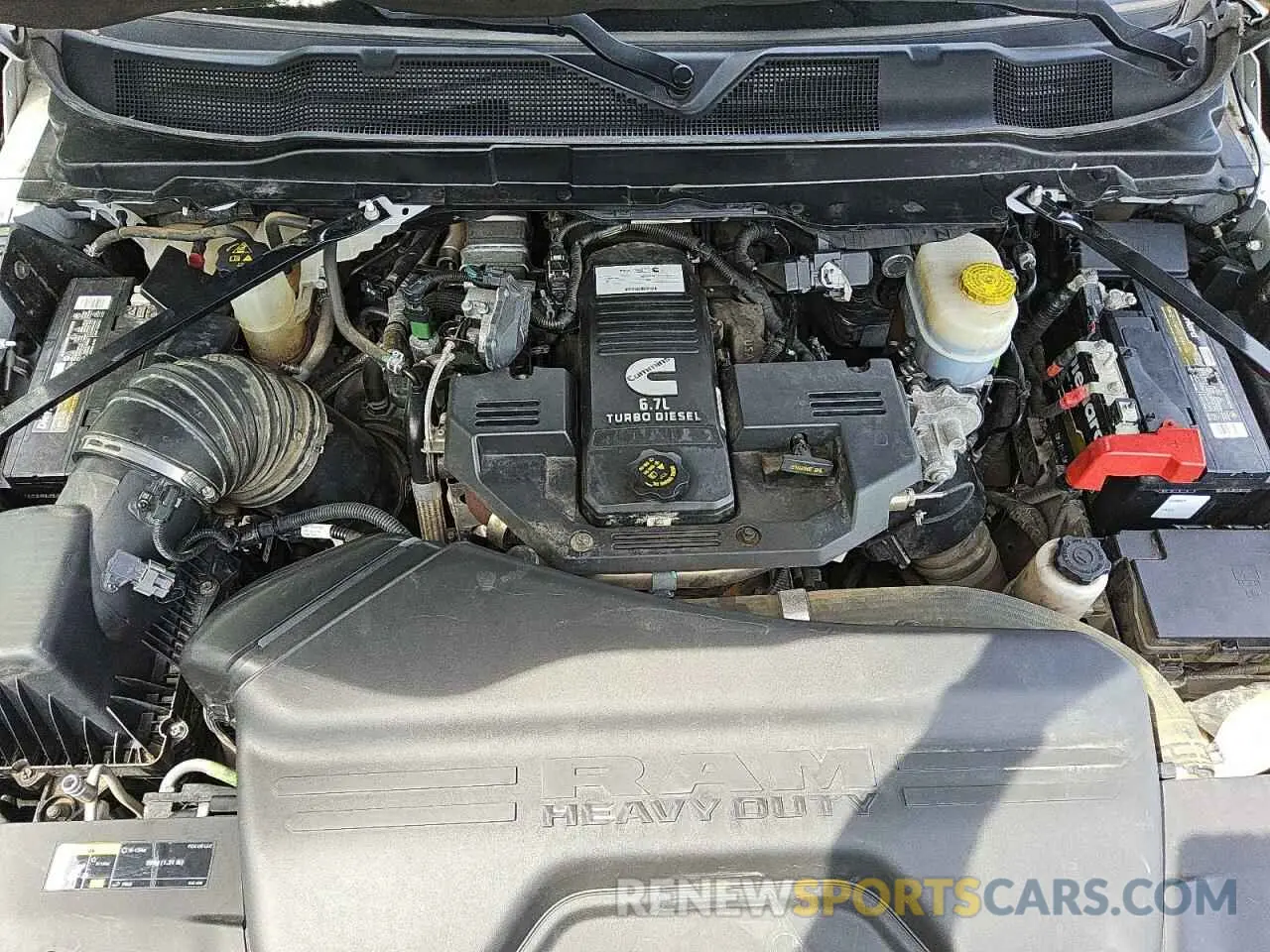 11 Photograph of a damaged car 3C63RRHL5NG291370 RAM 3500 2022