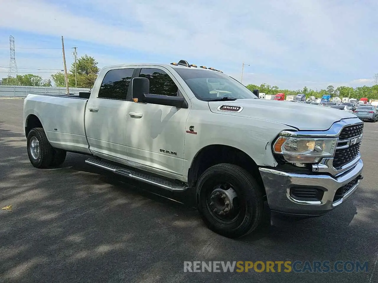 4 Photograph of a damaged car 3C63RRHL5NG291370 RAM 3500 2022