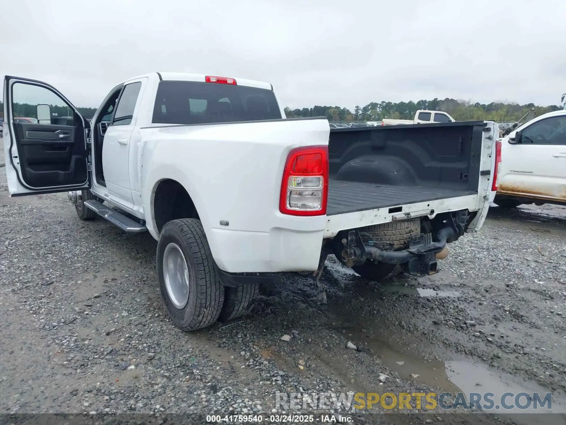 11 Photograph of a damaged car 3C63RRHL6NG302814 RAM 3500 2022
