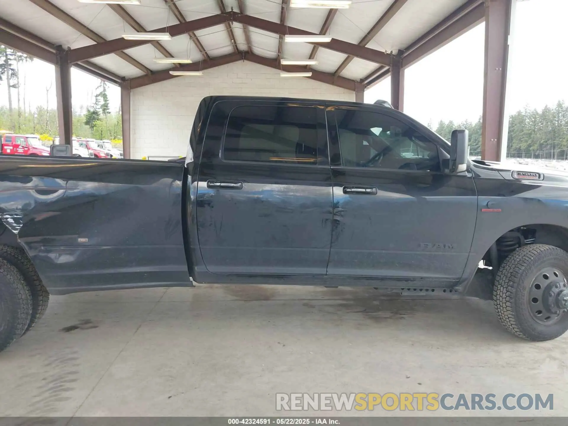 13 Photograph of a damaged car 3C63RRHL9NG135784 RAM 3500 2022