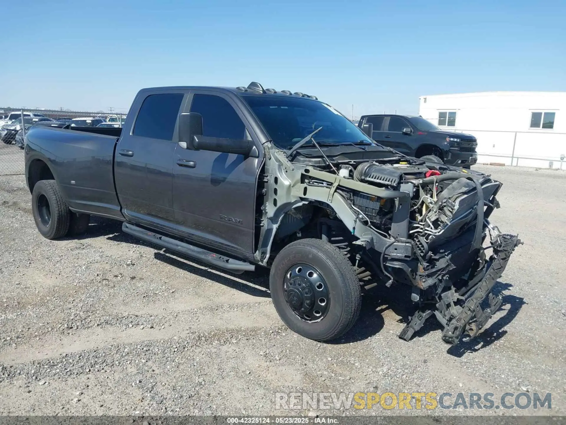 1 Photograph of a damaged car 3C63RRHLXNG216048 RAM 3500 2022