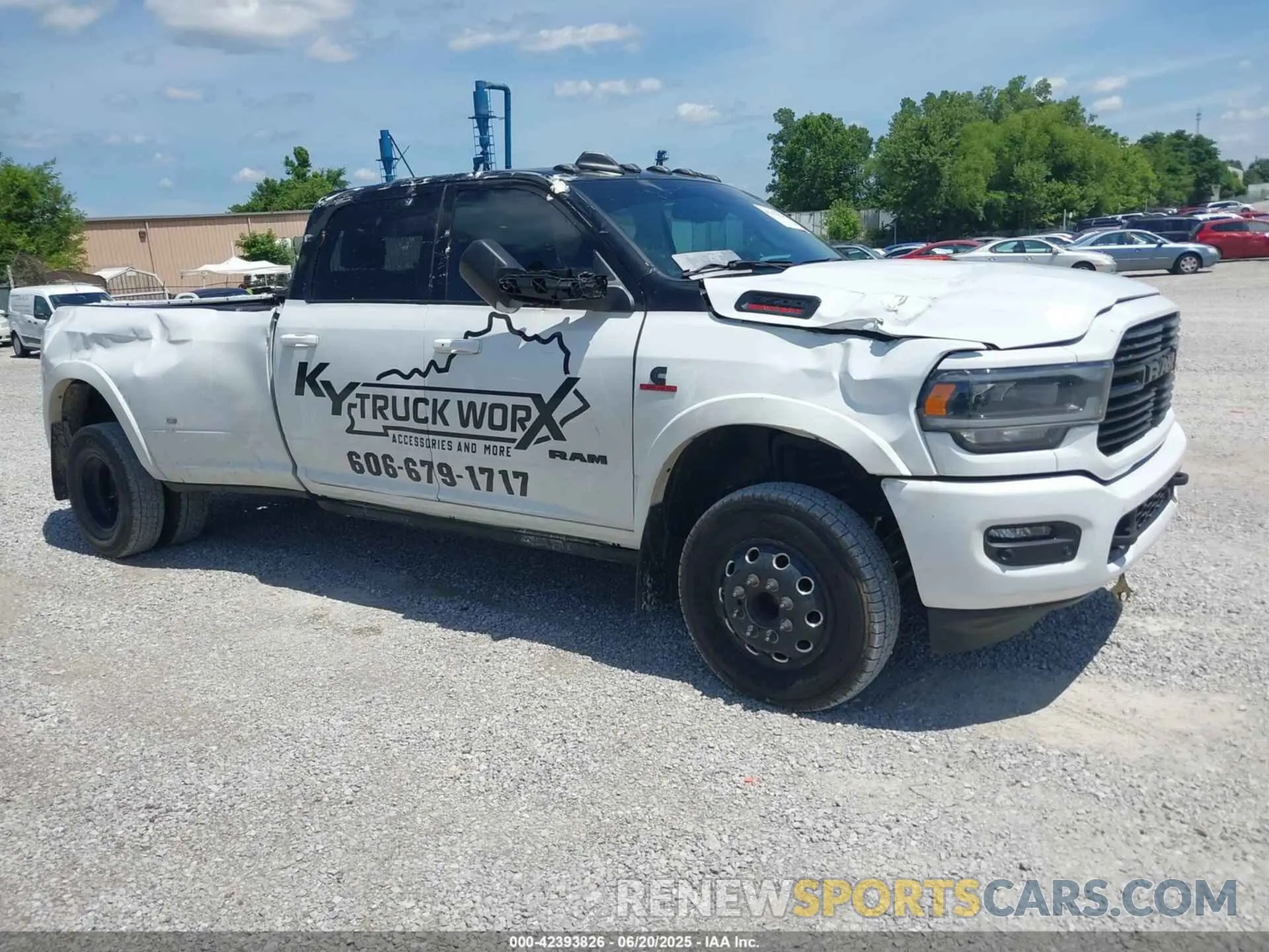1 Photograph of a damaged car 3C63RRJL2NG355679 RAM 3500 2022